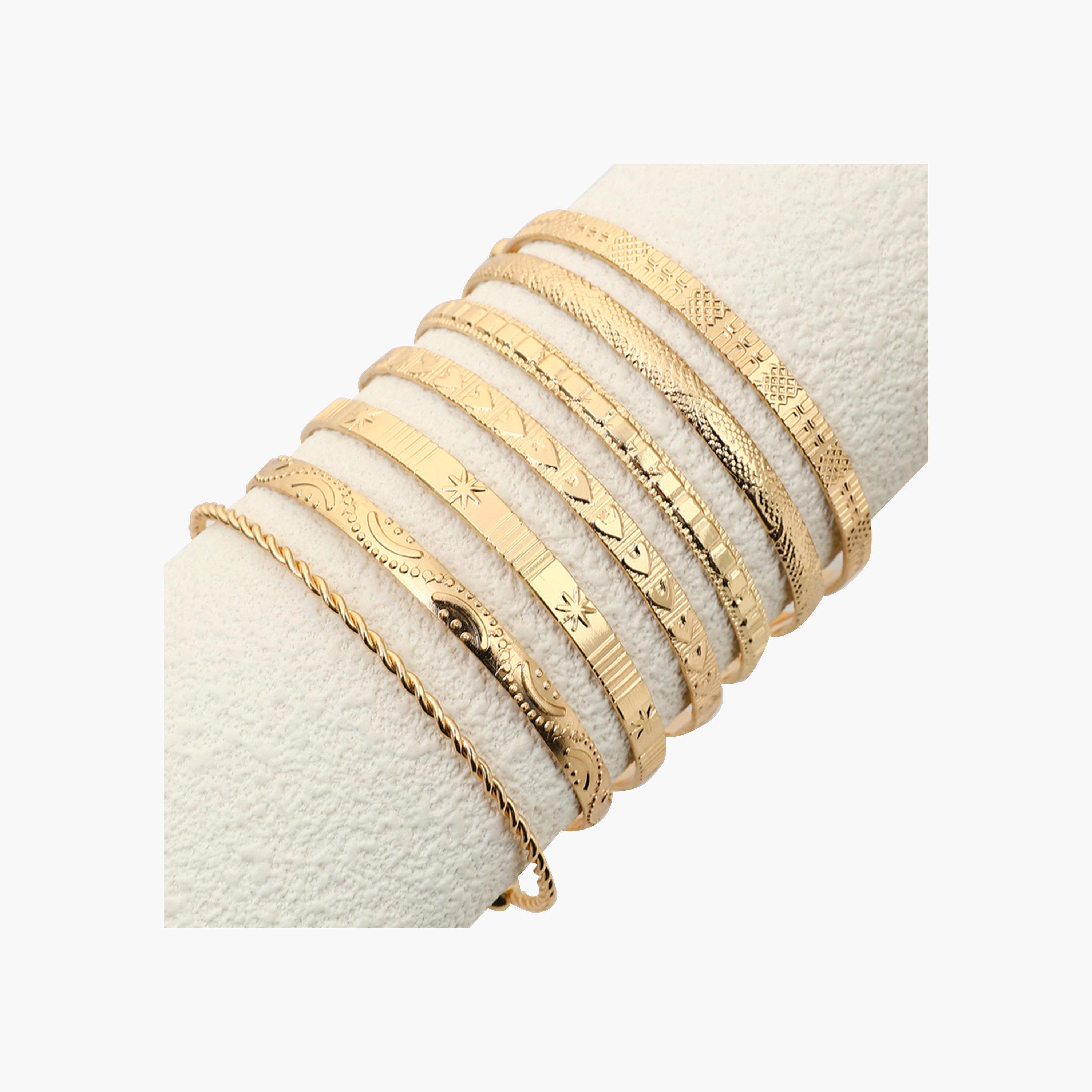 تيك تو - مجموعة من 7 أساور مطروقة ومزخرفة-women-watchesandjewellery-jewellery-banglesandbracelets-image-1