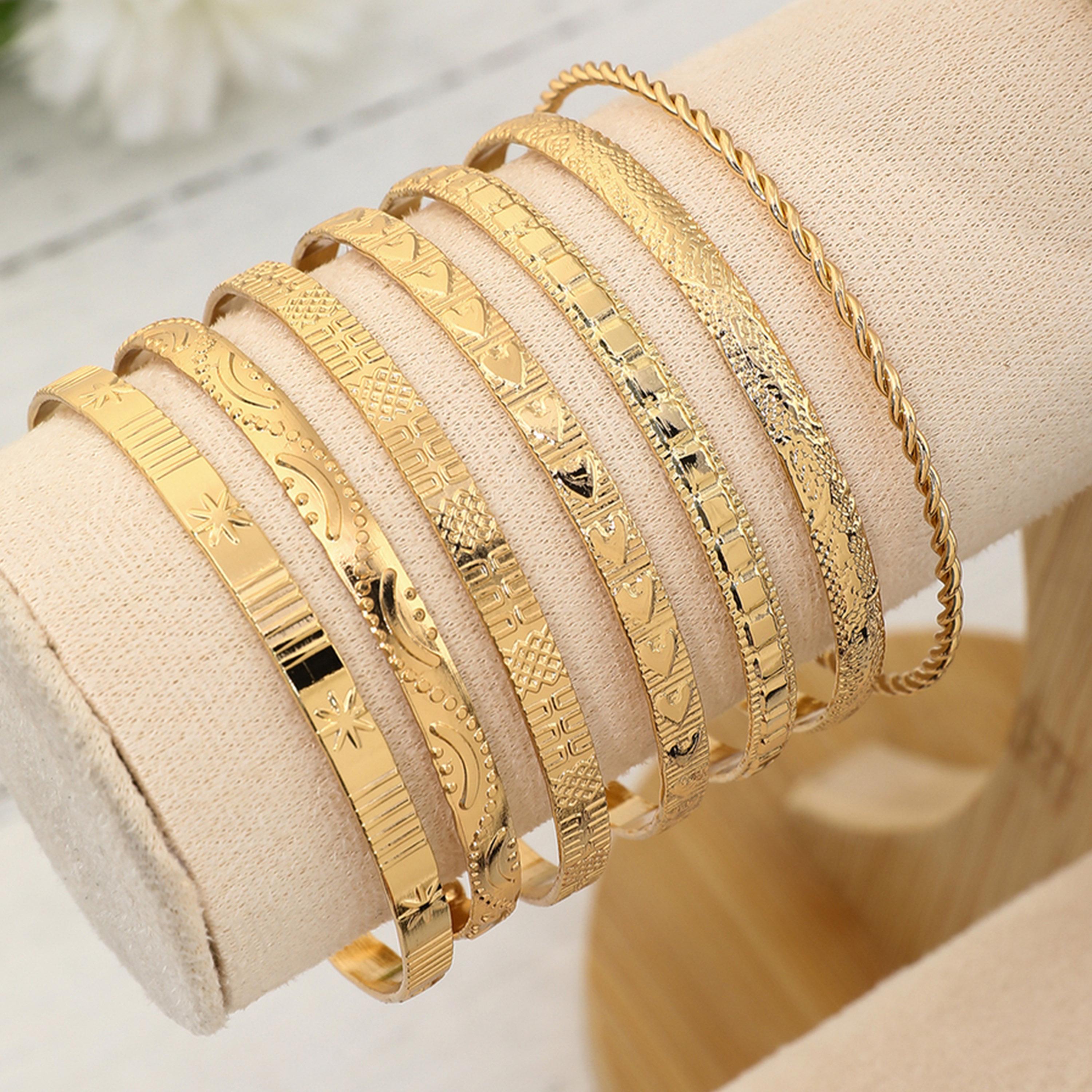 تيك تو - مجموعة من 7 أساور مطروقة ومزخرفة-women-watchesandjewellery-jewellery-banglesandbracelets-image-3