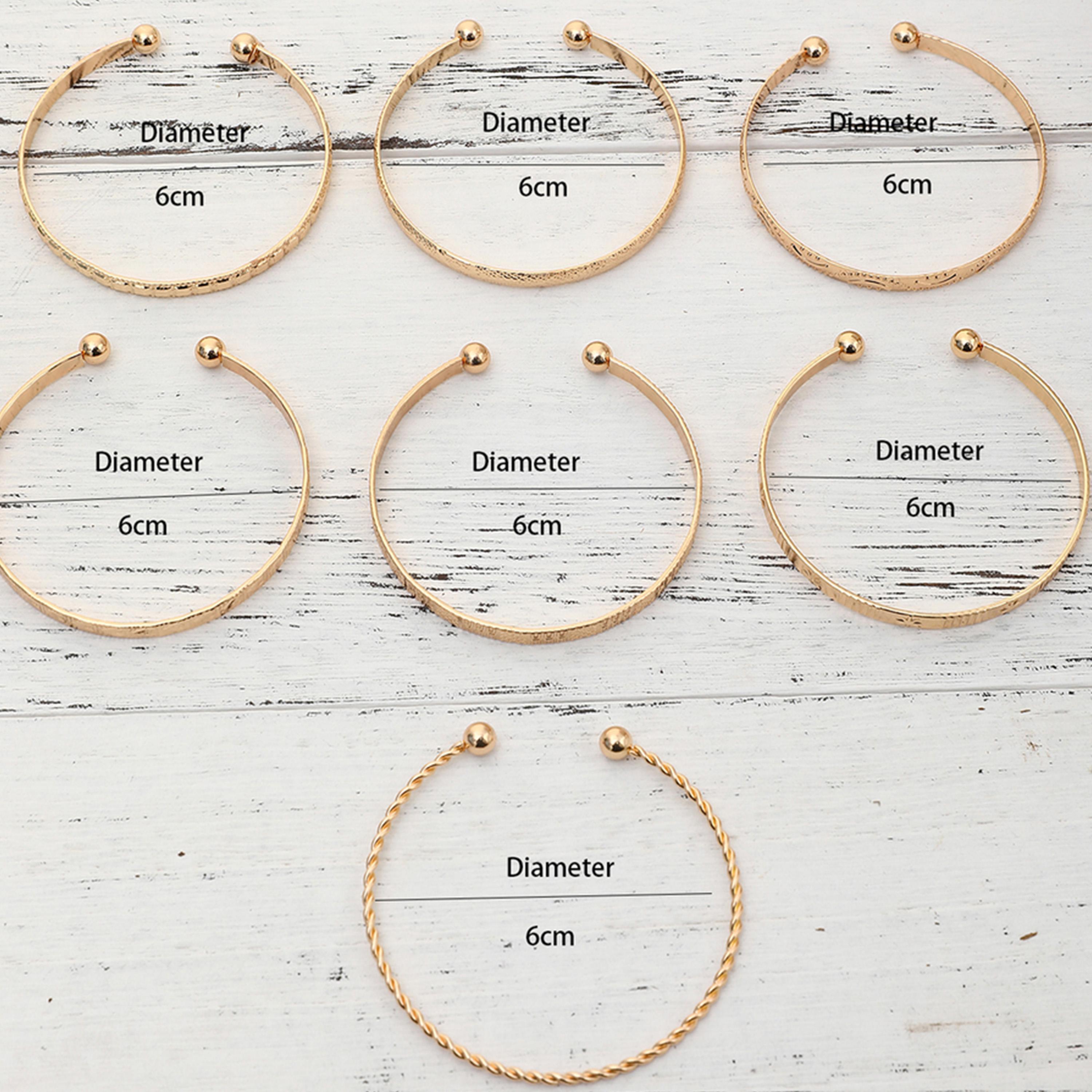 تيك تو - مجموعة من 7 أساور مطروقة ومزخرفة-women-watchesandjewellery-jewellery-banglesandbracelets-image-4
