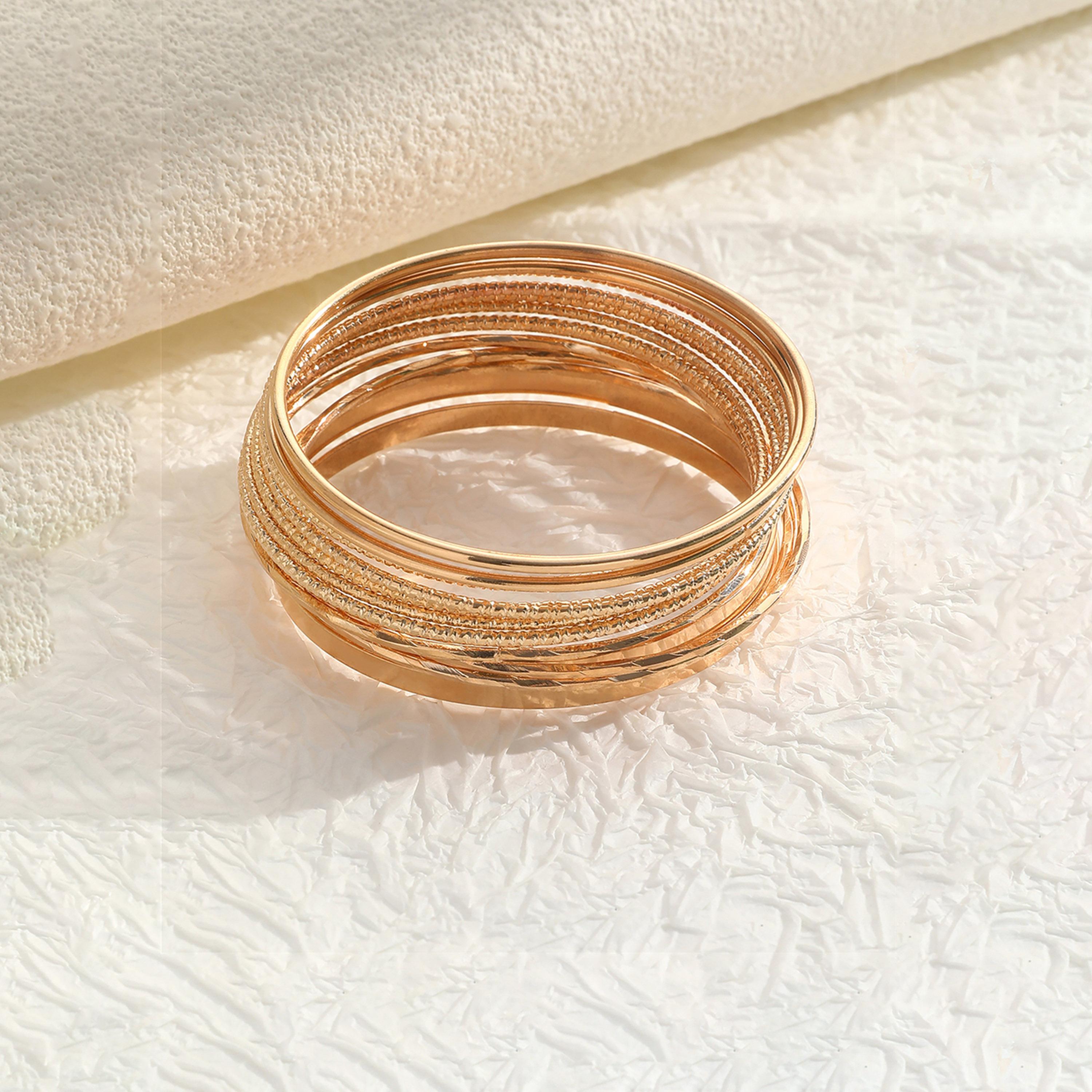 Take Two Women  Set of 14 - Gold Tone Bangles-women-watchesandjewellery-jewellery-banglesandbracelets-image-1