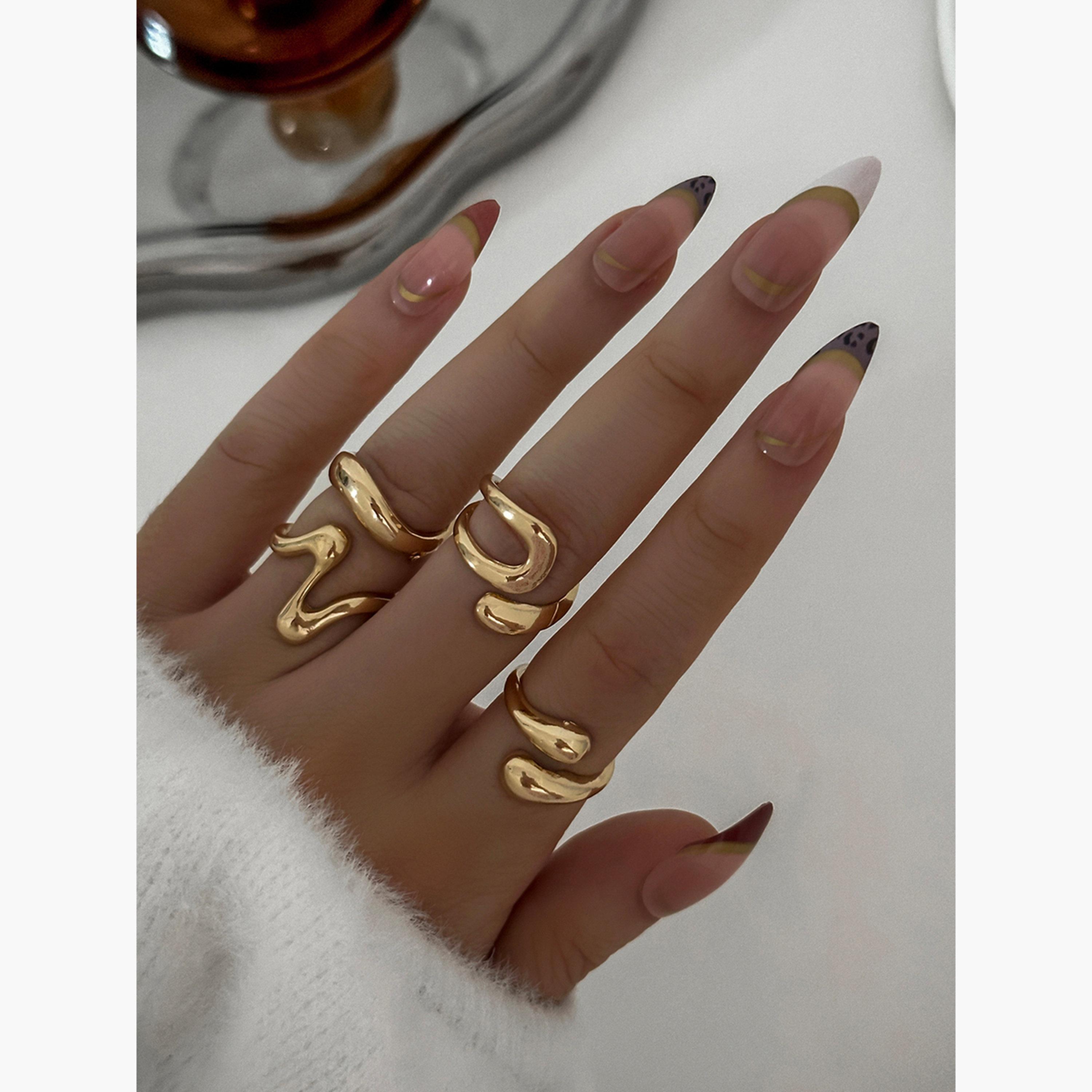 تيك تو - مجموعة من 4 خواتم ذهبية اللون-women-watchesandjewellery-jewellery-rings-image-2