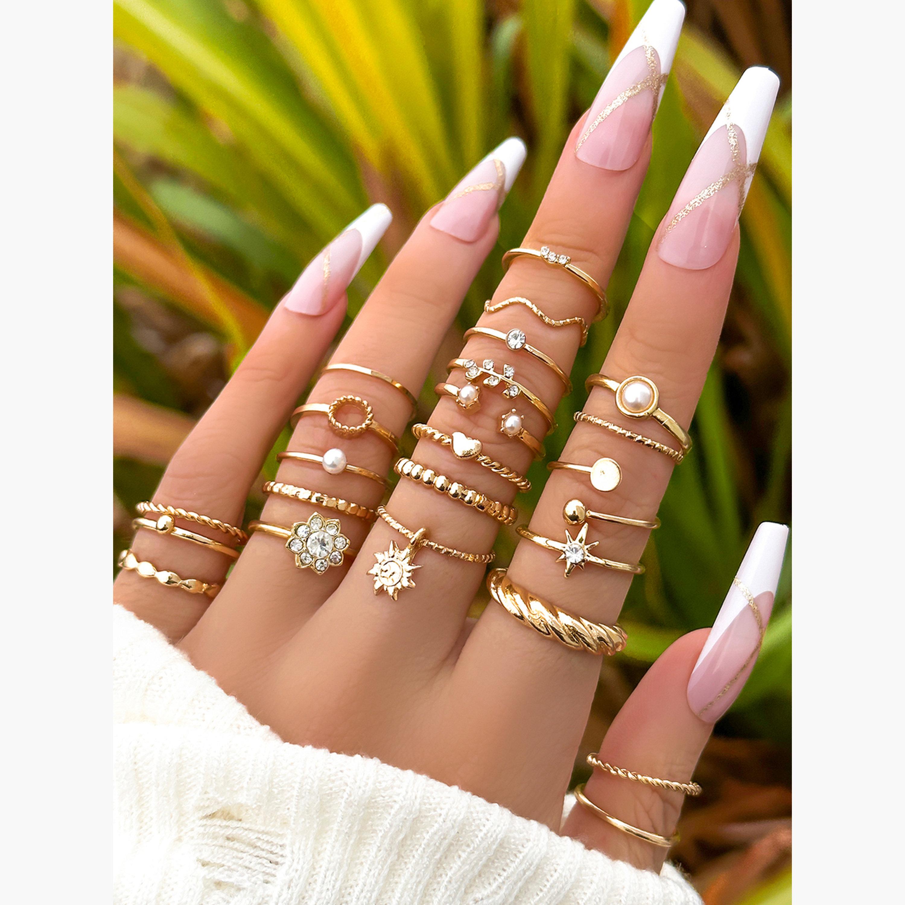 تيك تو - مجموعة من 23 خاتمًا ذهبيًا كاجوال-women-watchesandjewellery-jewellery-rings-image-2