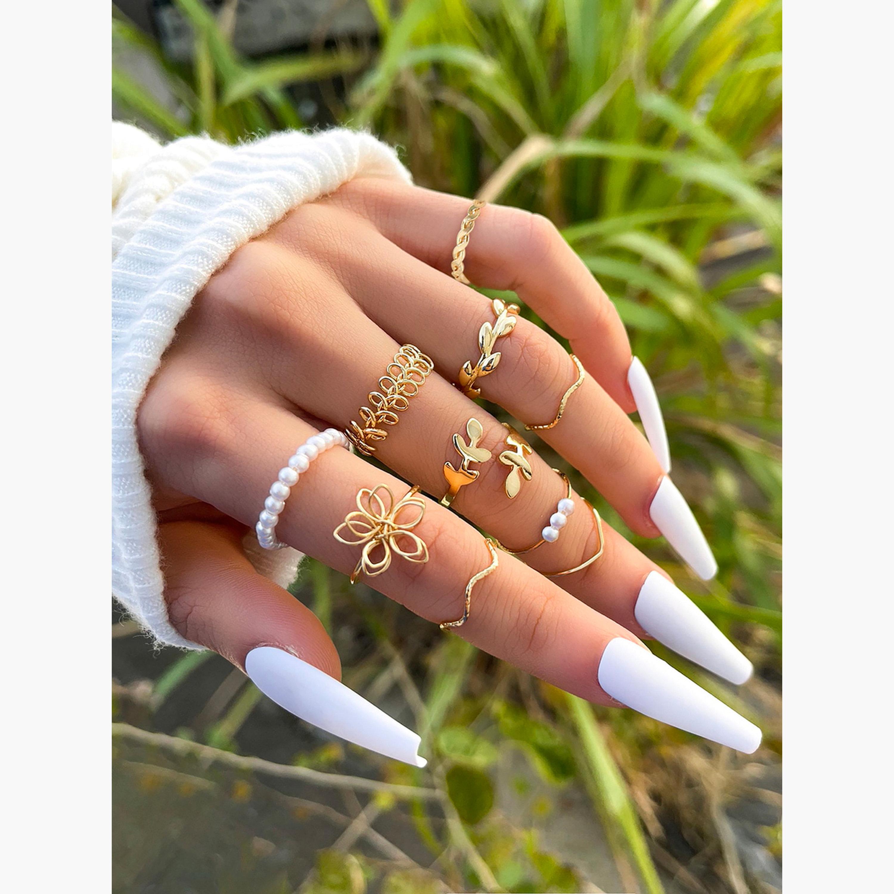 تيك تو - مجموعة من 10 خواتم مزينة باللؤلؤ الصناعي-women-watchesandjewellery-jewellery-rings-image-2