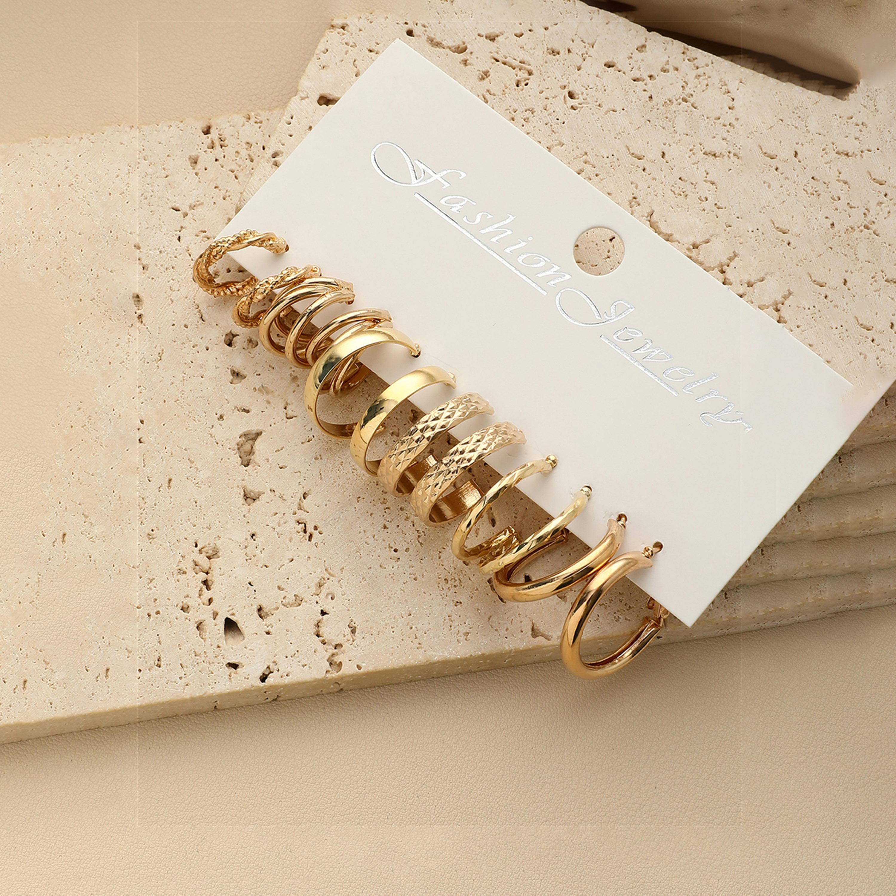 تيك تو - مجموعة من 6 أقراط دائرية ذهبية اللون-women-watchesandjewellery-jewellery-earrings-image-5