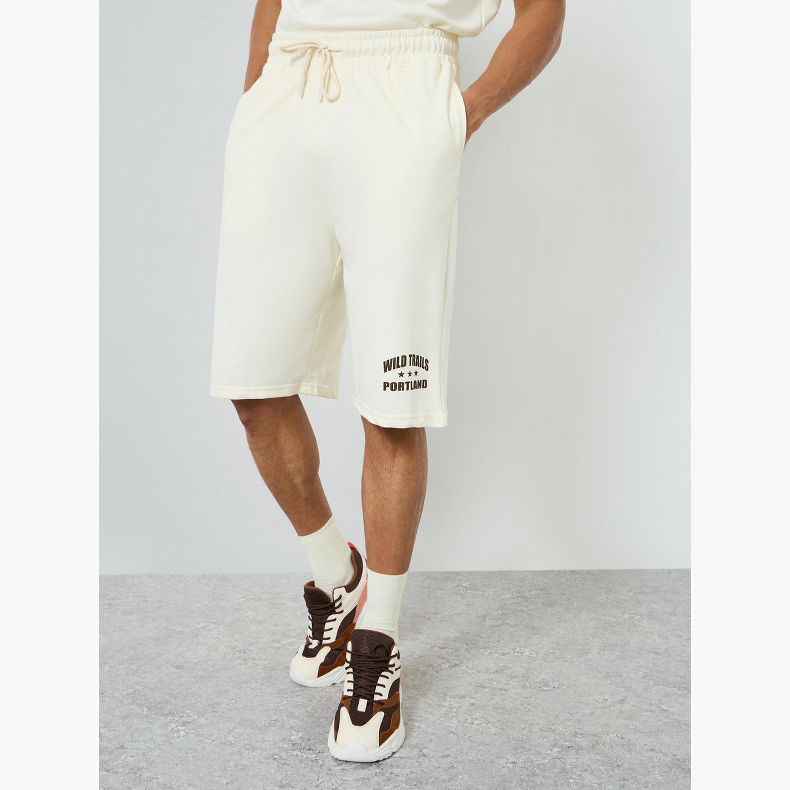 Styli Men Cream Minimal Print Oversized T-Shirt and Shorts Co-Ords-men-clothing-coordsets-image-5