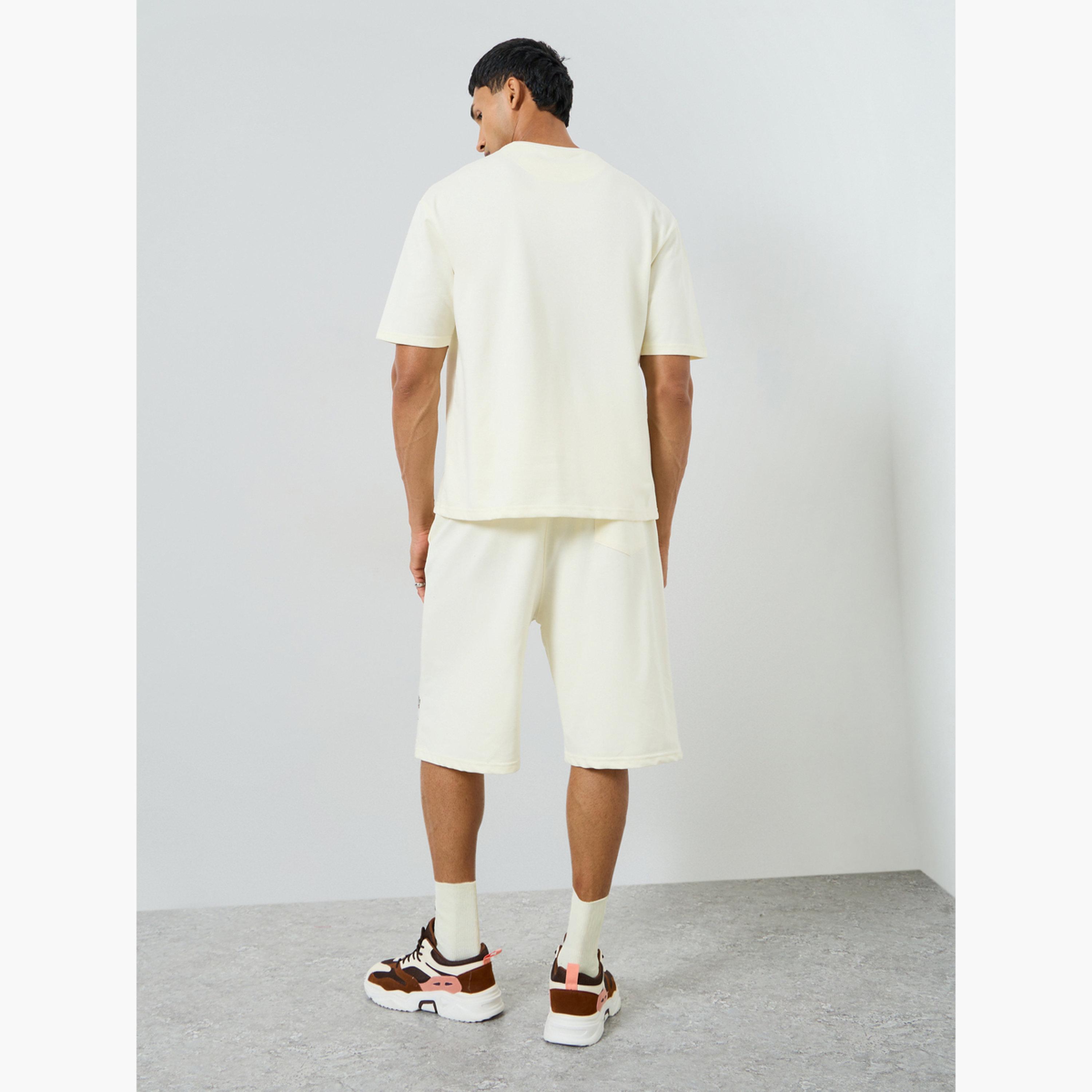 Styli Men Cream Minimal Print Oversized T-Shirt and Shorts Co-Ords-men-clothing-coordsets-image-6