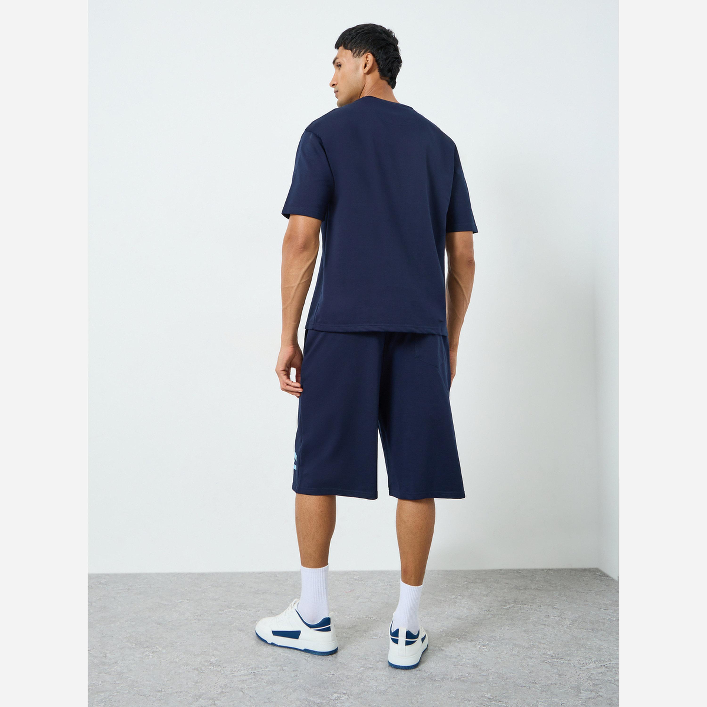 ستايلي - طقم تيشيرت وشورت رجالي مقاس واسع طبعة بسيطة-men-clothing-coordsets-image-5