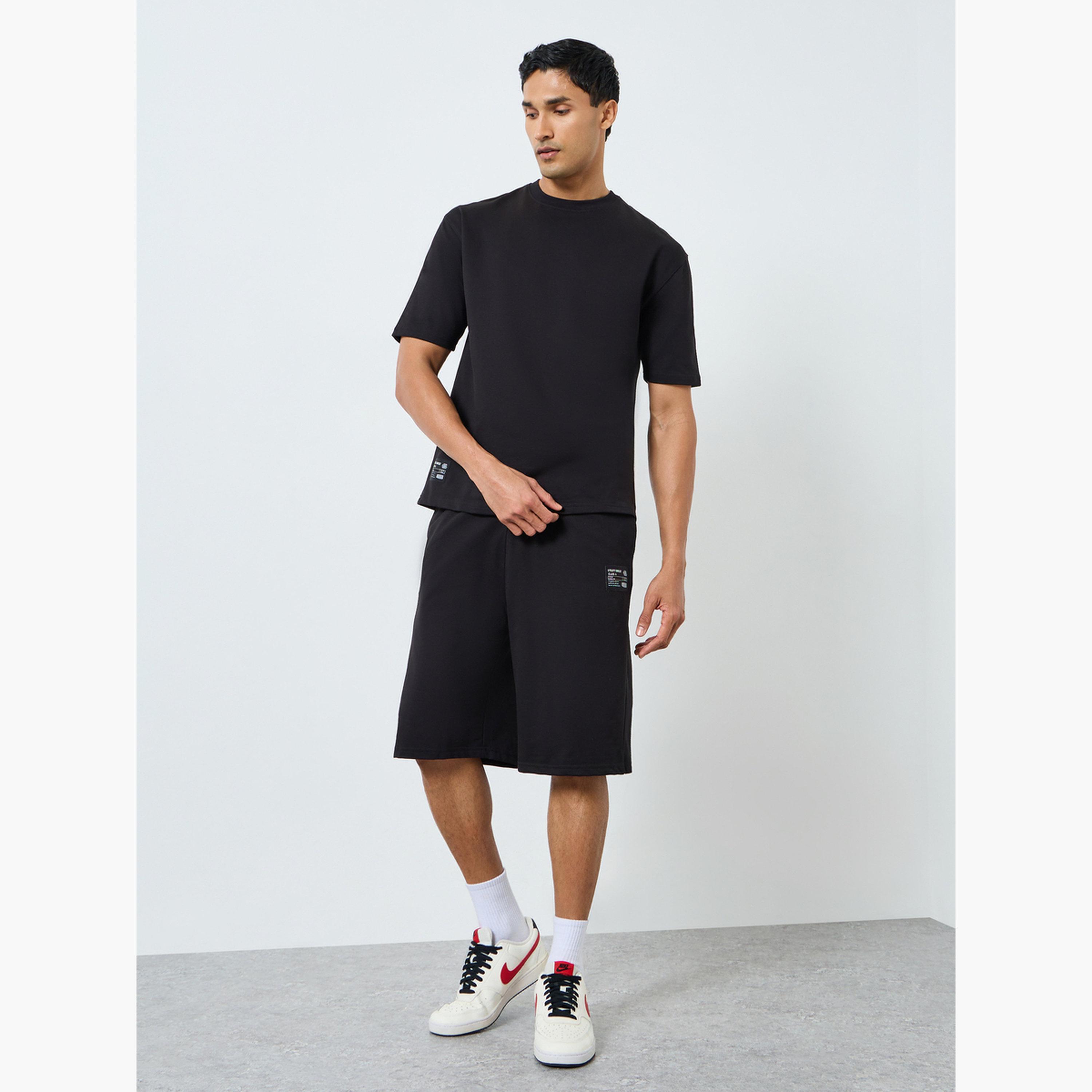Styli Men Black Oversized T-Shirt and Shorts Co-Ords-men-clothing-coordsets-image-1