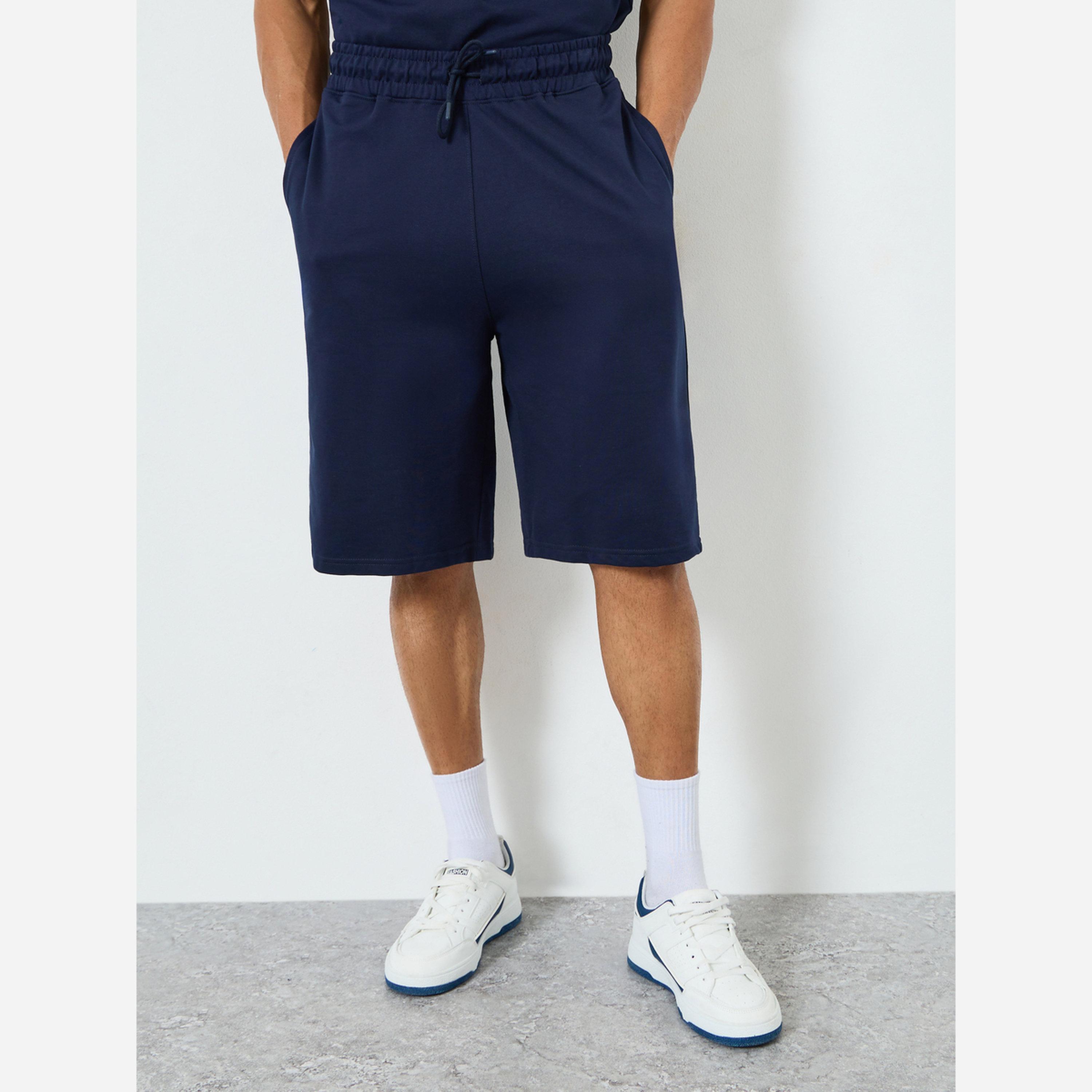 Styli Men Oversized Minimal Print T-Shirt and Shorts Co-Ords-men-clothing-coordsets-image-4
