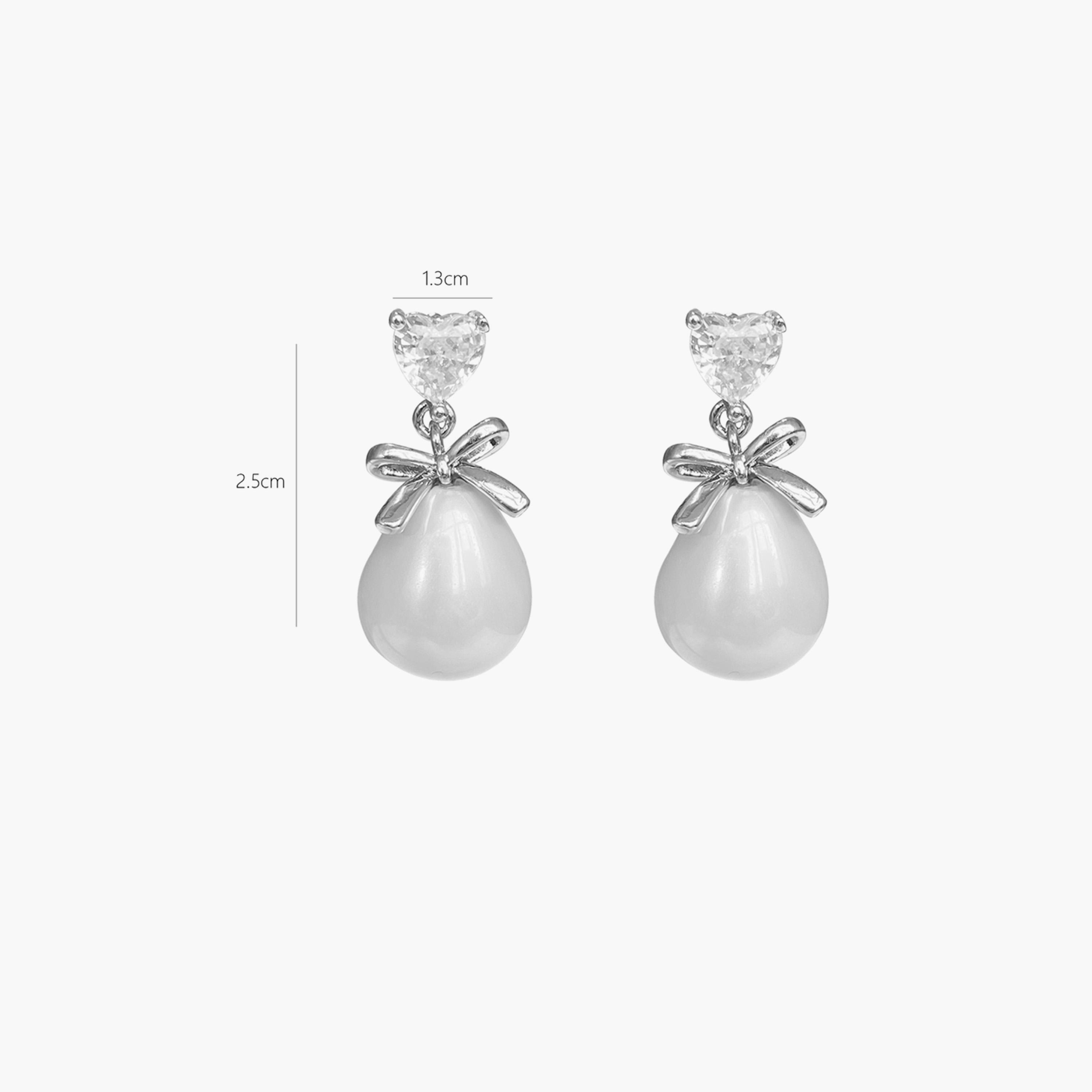 تيك تو - أقراط متدلية من الفضة على شكل فيونكة من اللؤلؤ الصناعي-women-watchesandjewellery-jewellery-earrings-image-5