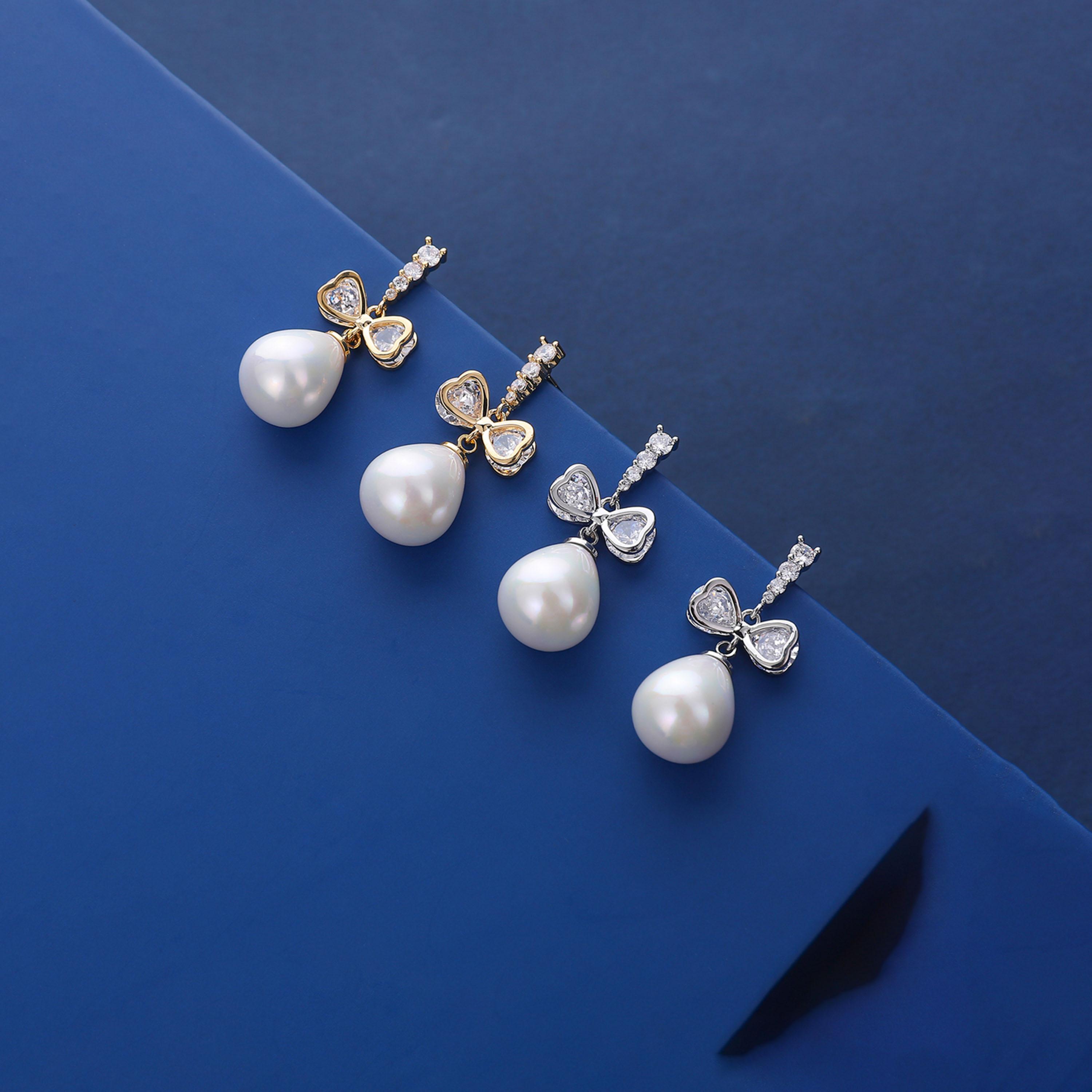 Take Two Gold Faux Pearl Bow Drop Earrings-women-watchesandjewellery-jewellery-earrings-image-3