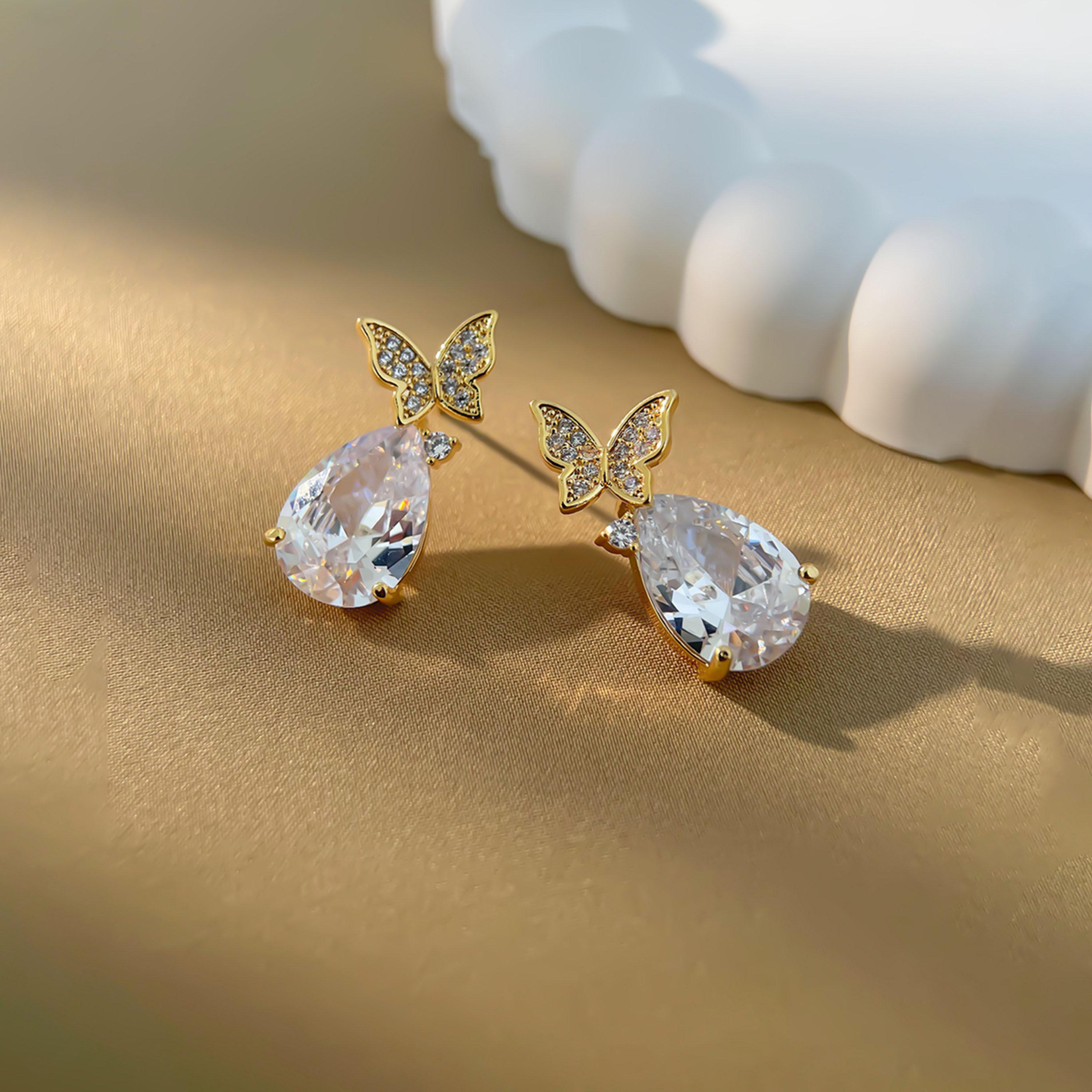 تيك تو - أقراط متدلية مزينة بزخارف الفراشة-women-watchesandjewellery-jewellery-earrings-image-3