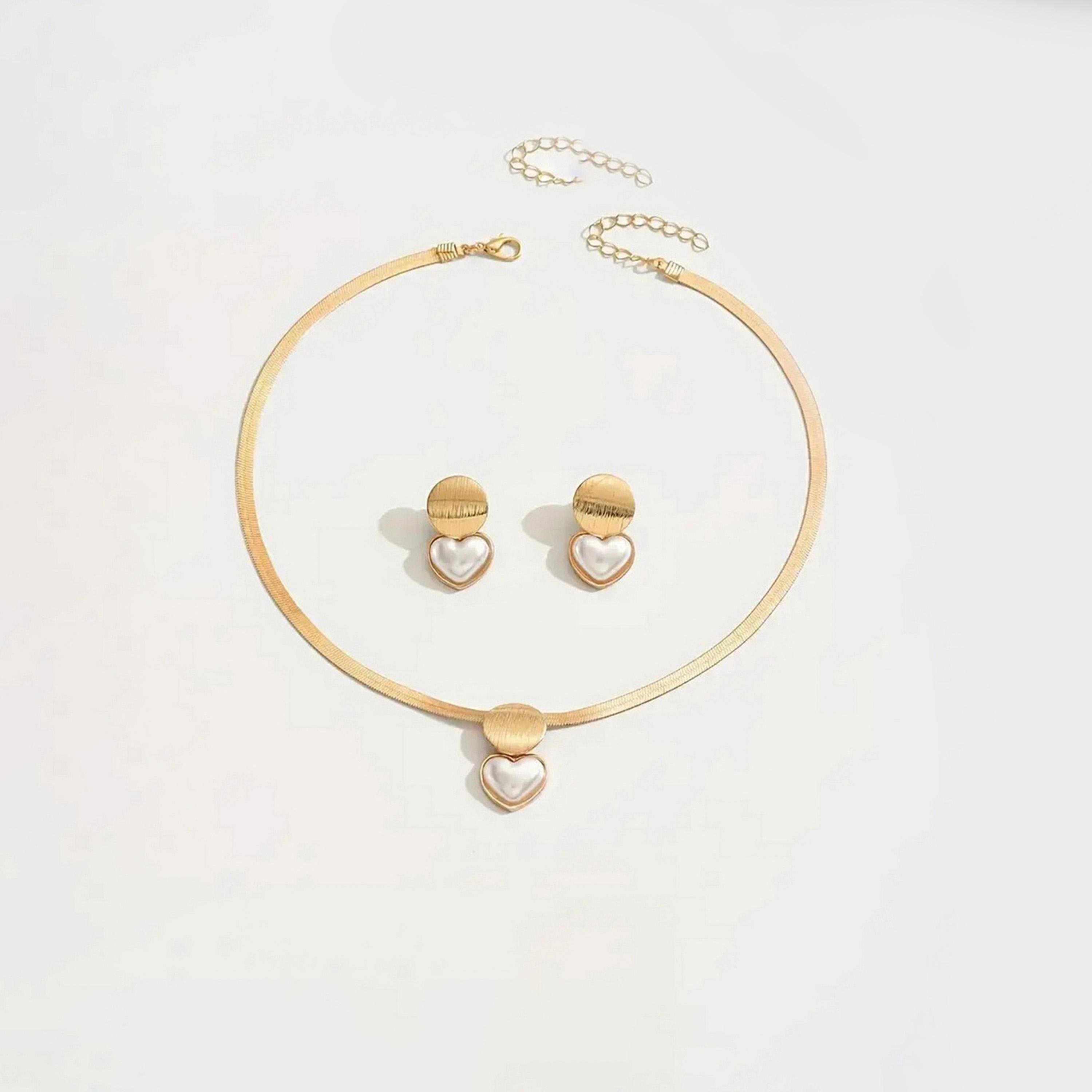 تيك تو - مجوهرات من قلادة وأقراط على شكل قلب من اللؤلؤ الصناعي-women-watchesandjewellery-jewellery-jewellerysets-image-1