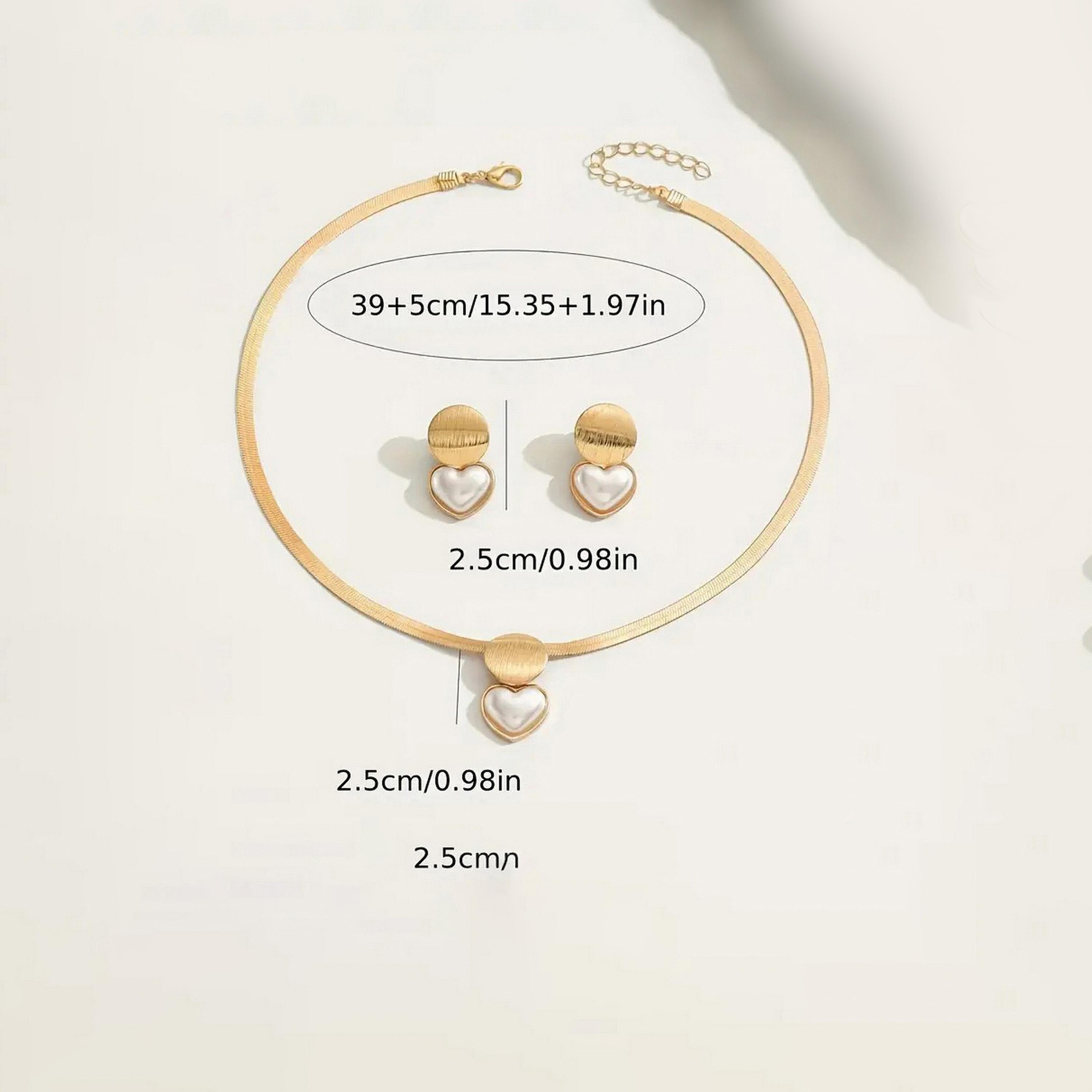 تيك تو - مجوهرات من قلادة وأقراط على شكل قلب من اللؤلؤ الصناعي-women-watchesandjewellery-jewellery-jewellerysets-image-4