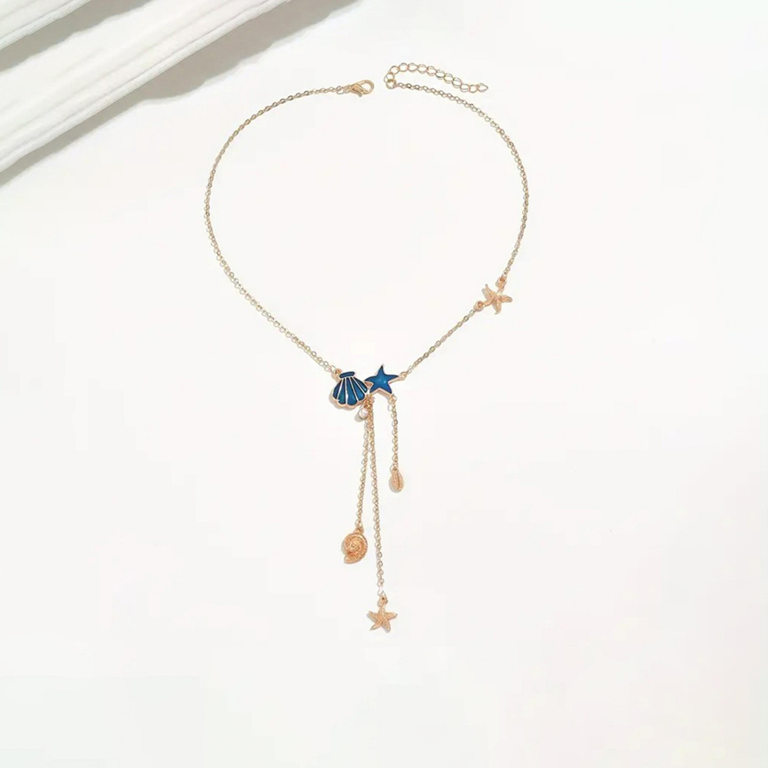 تيك تو - قلادة ذهبية اللون على شكل حرف Y من صدفة البحر-women-watchesandjewellery-jewellery-necklacesandpendants-image-1