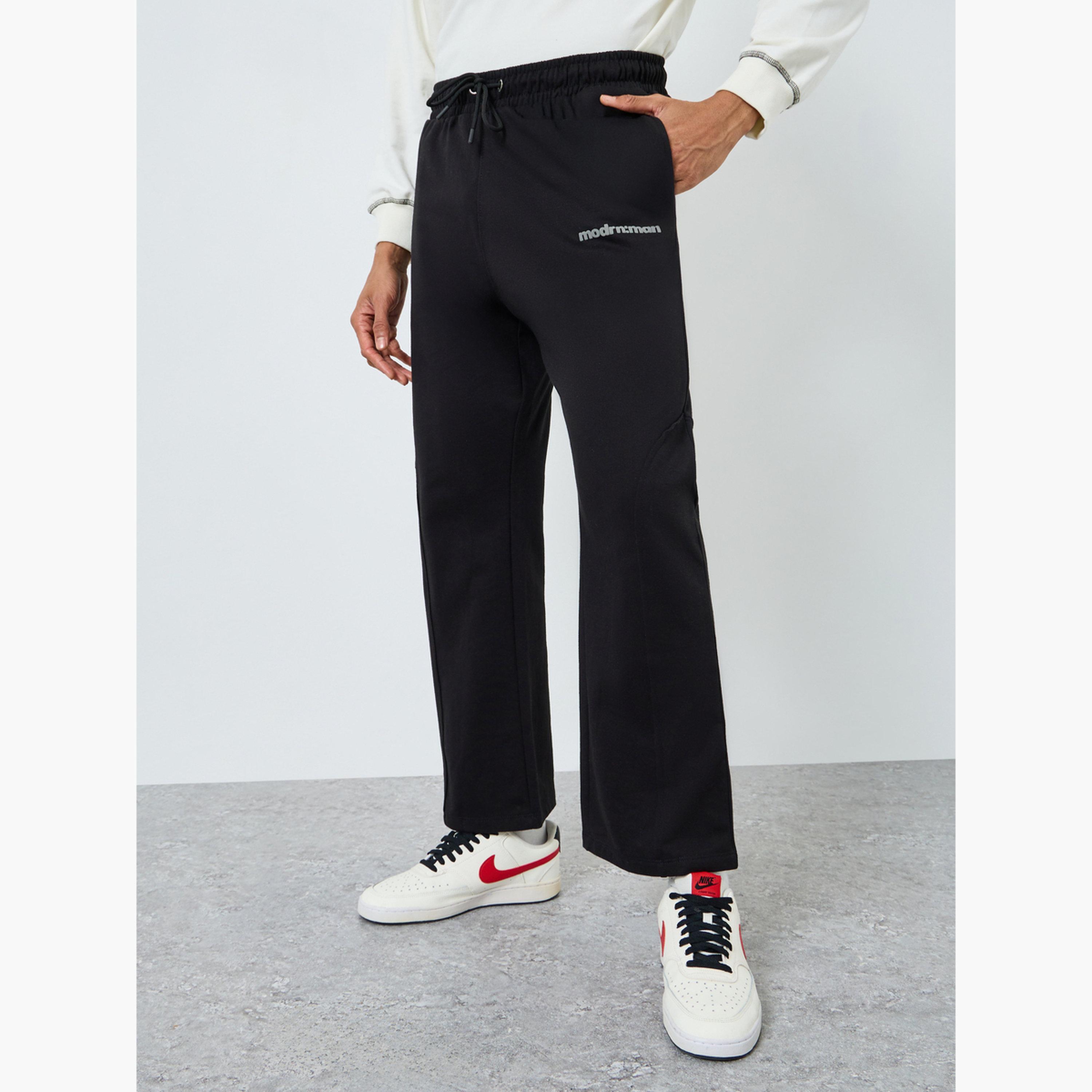 جوغر مطبوع بشعار وقصة واسعة-men-clothing-bottoms-joggers-image-1
