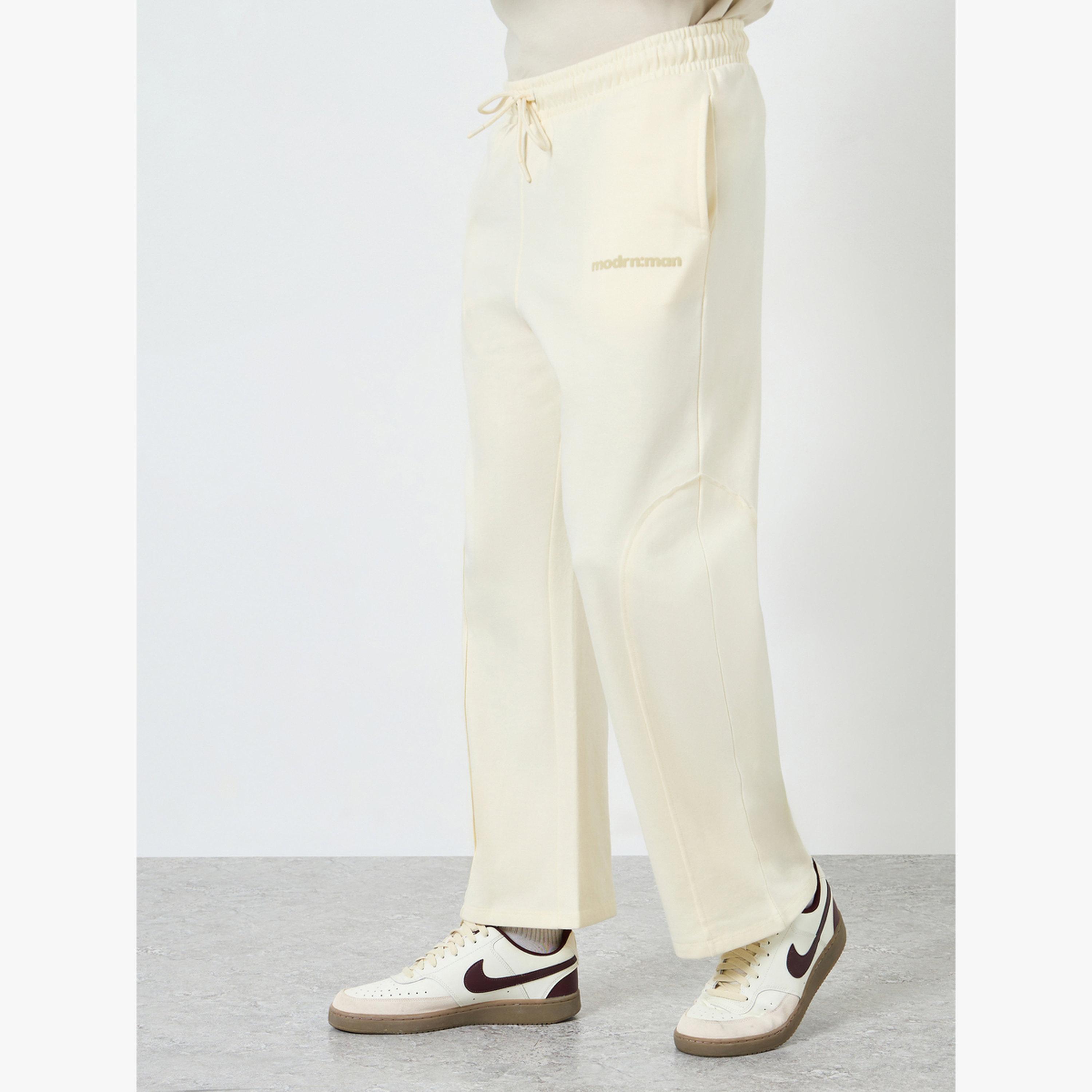 جوغر صوف بقصة واسعة وتفاصيل ألواح درزات-men-clothing-bottoms-joggers-image-1