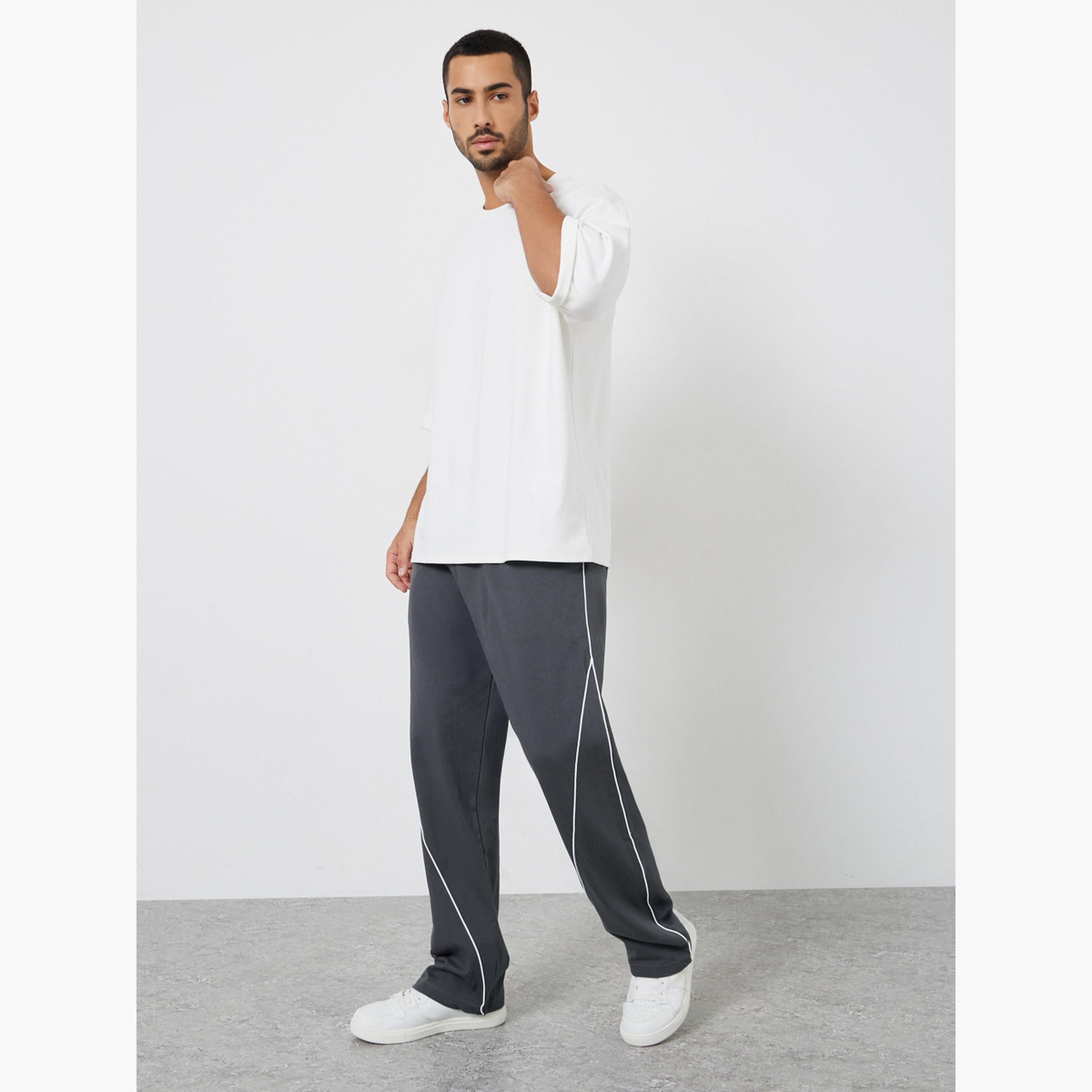 بنطال رياضي بتفاصيل خطوط بيضاء-men-clothing-bottoms-joggers-image-2