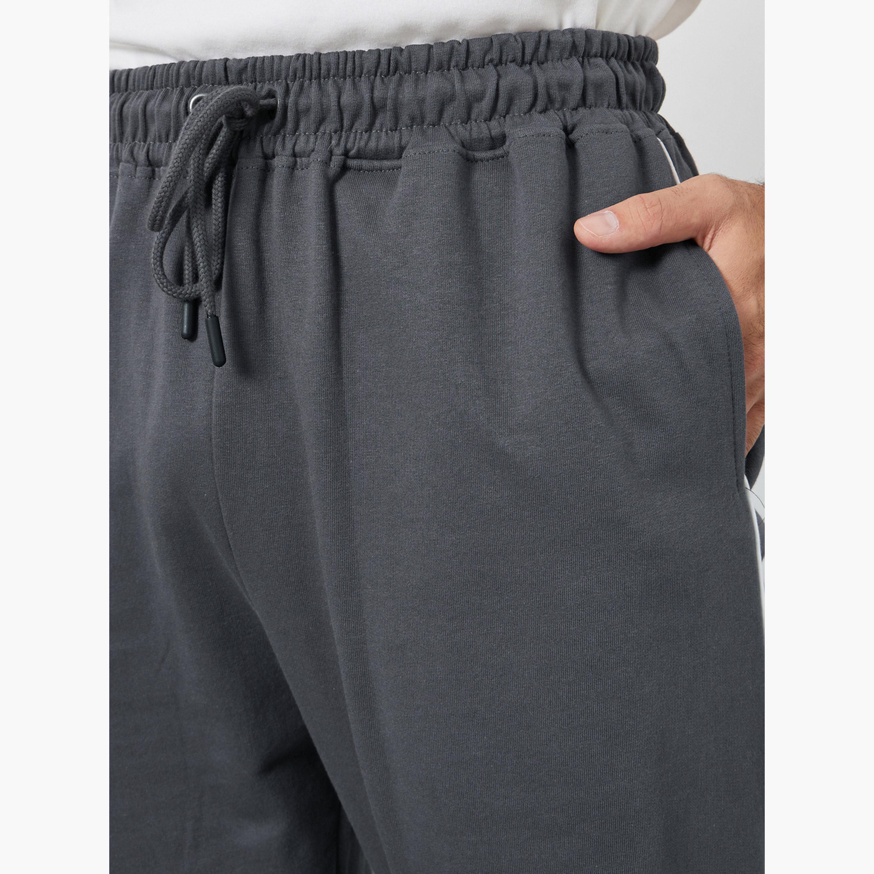 بنطال رياضي بتفاصيل خطوط بيضاء-men-clothing-bottoms-joggers-image-3
