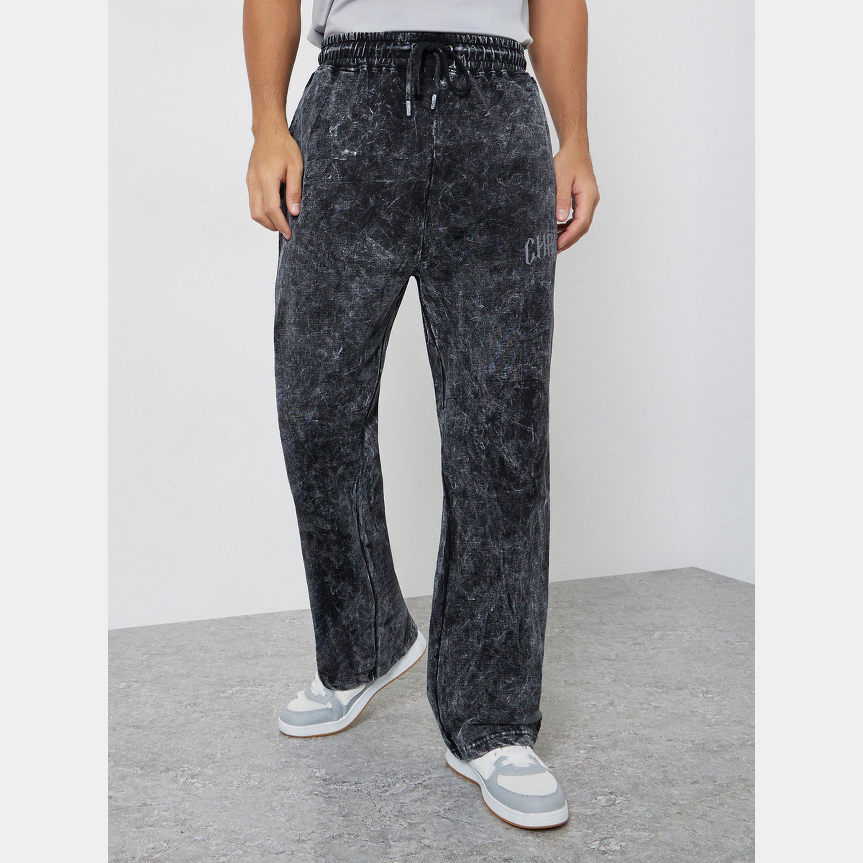 ستايلي - بنطال رياضي تيري مقاس واسع لون أسود مغسول بالحمض-men-clothing-bottoms-joggers-image-1