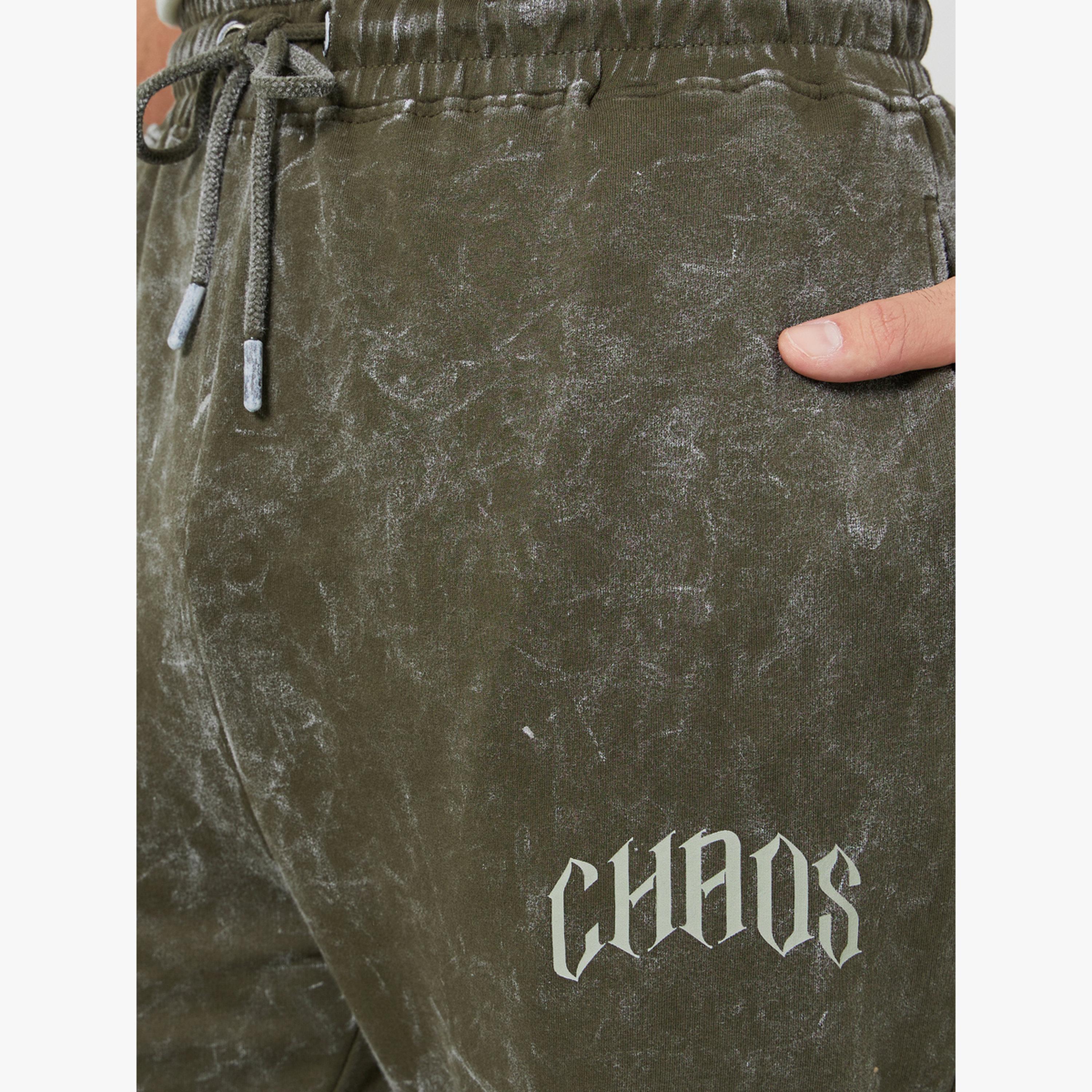 جوغر بقصة واسعة وبلمسة غسيل حامضي-men-clothing-bottoms-joggers-image-4