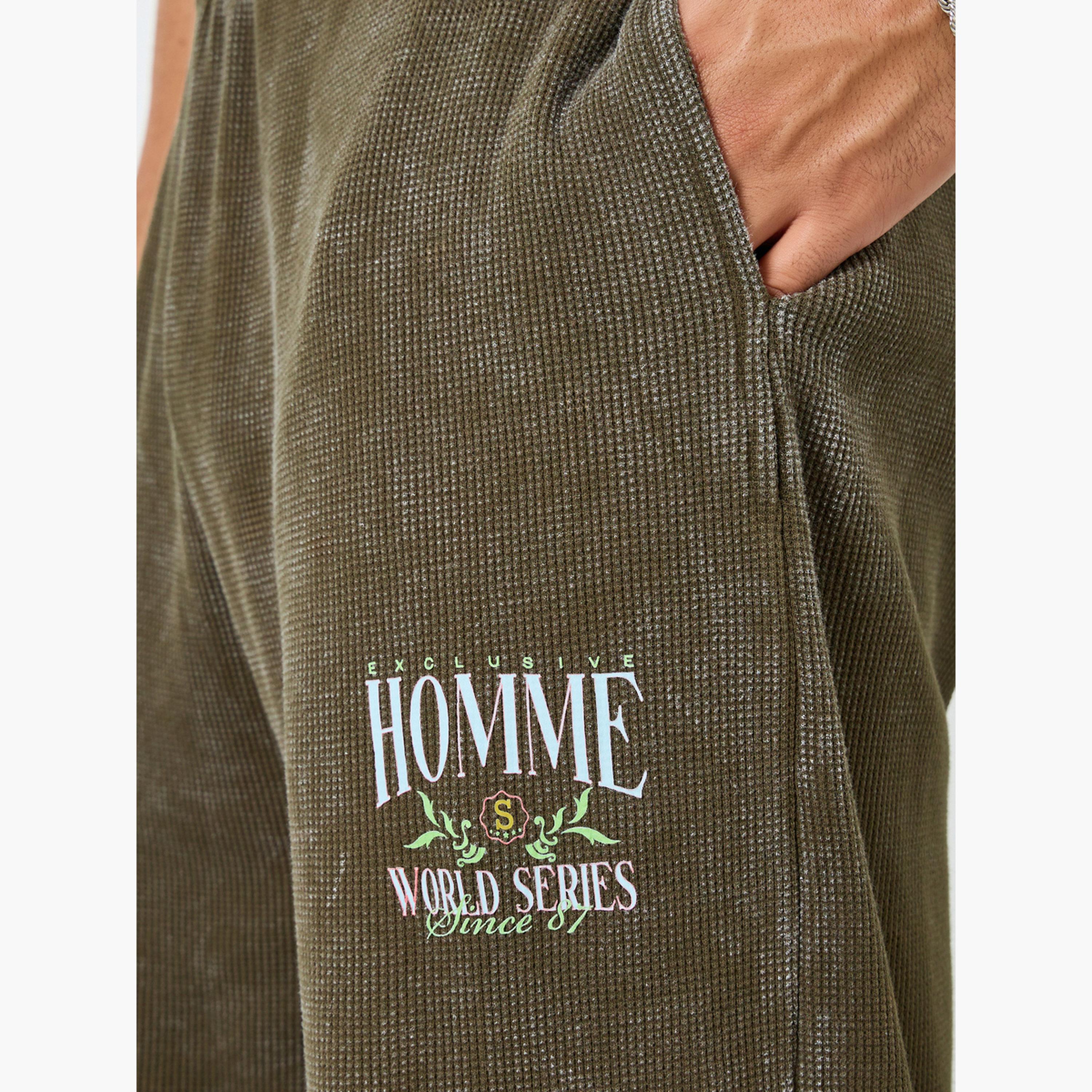 جوغر بطبعة جرافيك بقصة مريحة-men-clothing-bottoms-joggers-image-3