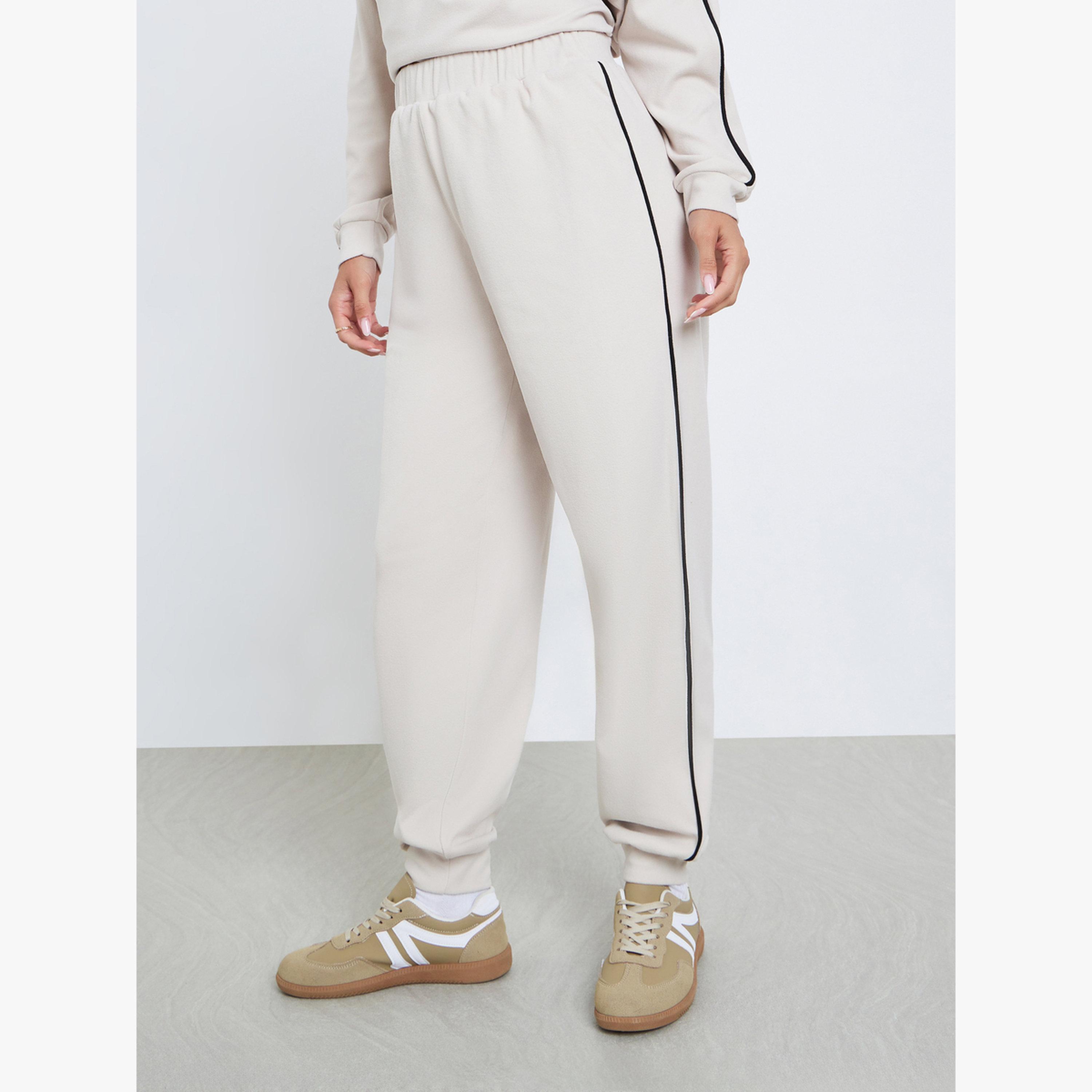Styli Women Cream Side Stripe Joggers-women-clothing-bottoms-joggers-image-1