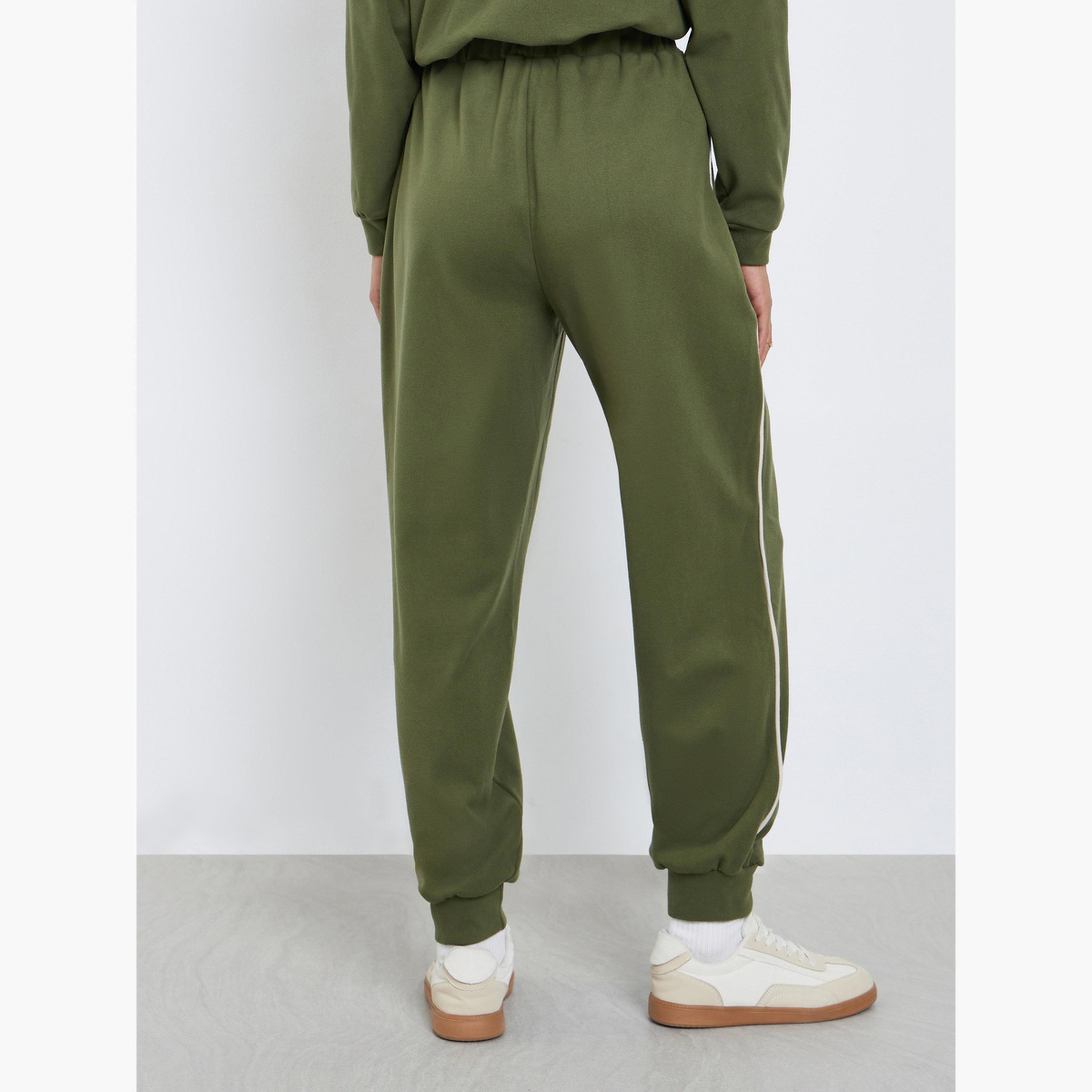 Styli Women Green Plain Relaxed Fit Joggers with Piping Detail-women-clothing-bottoms-joggers-image-4