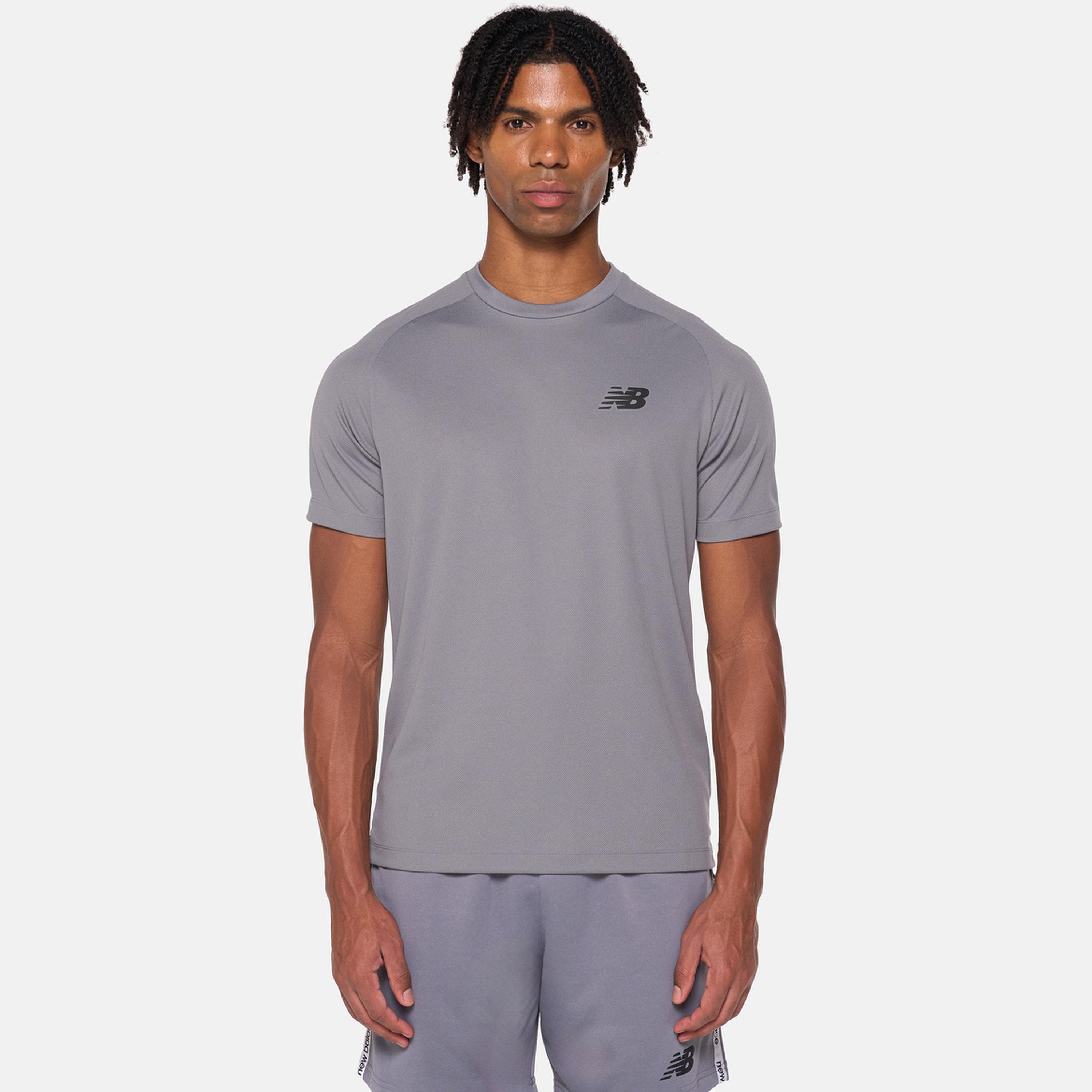 نيو بالانس - تي شيرت تدريب جيرسي فحمي للرجال-men-clothing-sportswearandactivewear-tshirtsandpolos-image-1