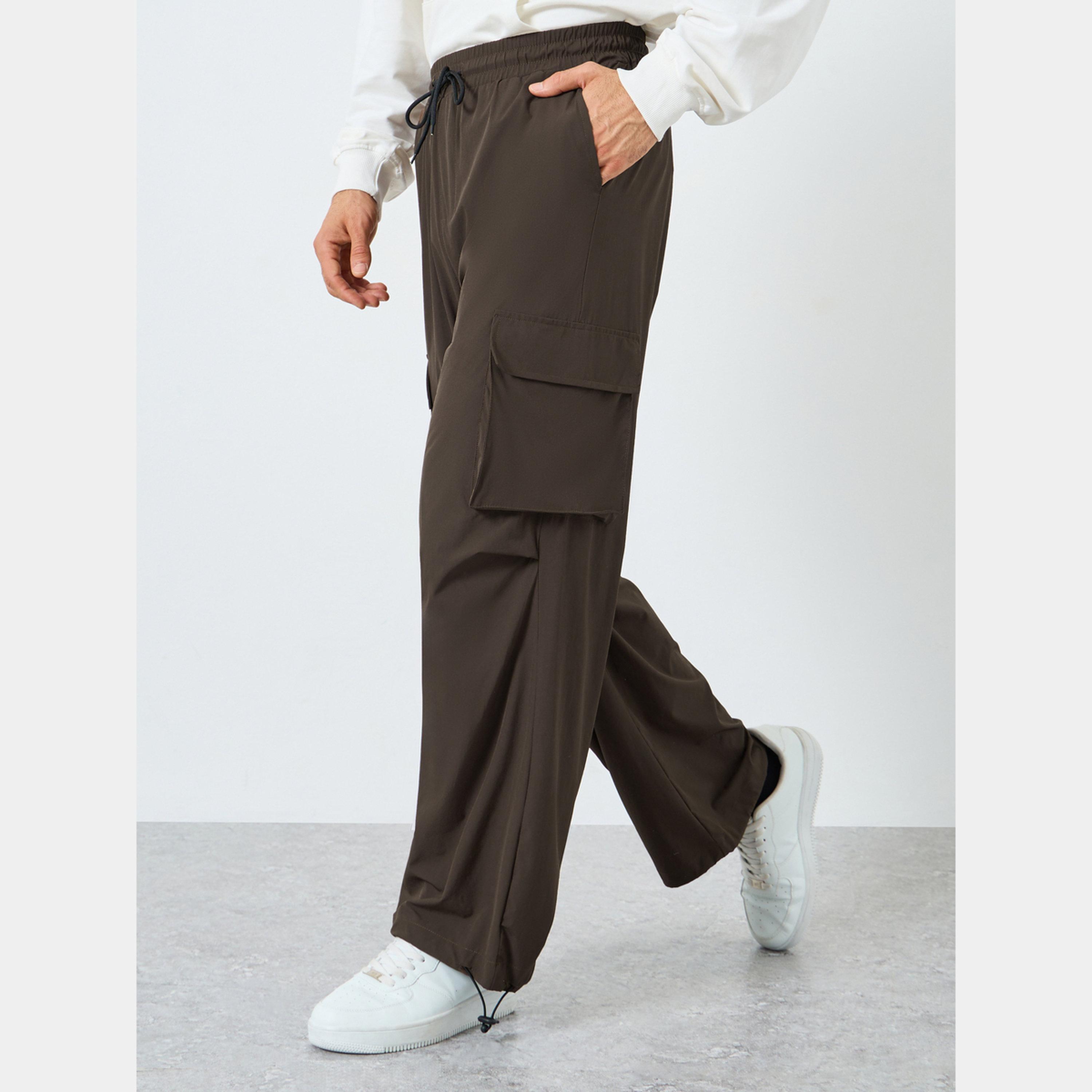 Styli Women Brown Plain Oversized Parachute Pants with Utility Pockets-men-clothing-bottoms-trousersandchinos-trousers-image-1