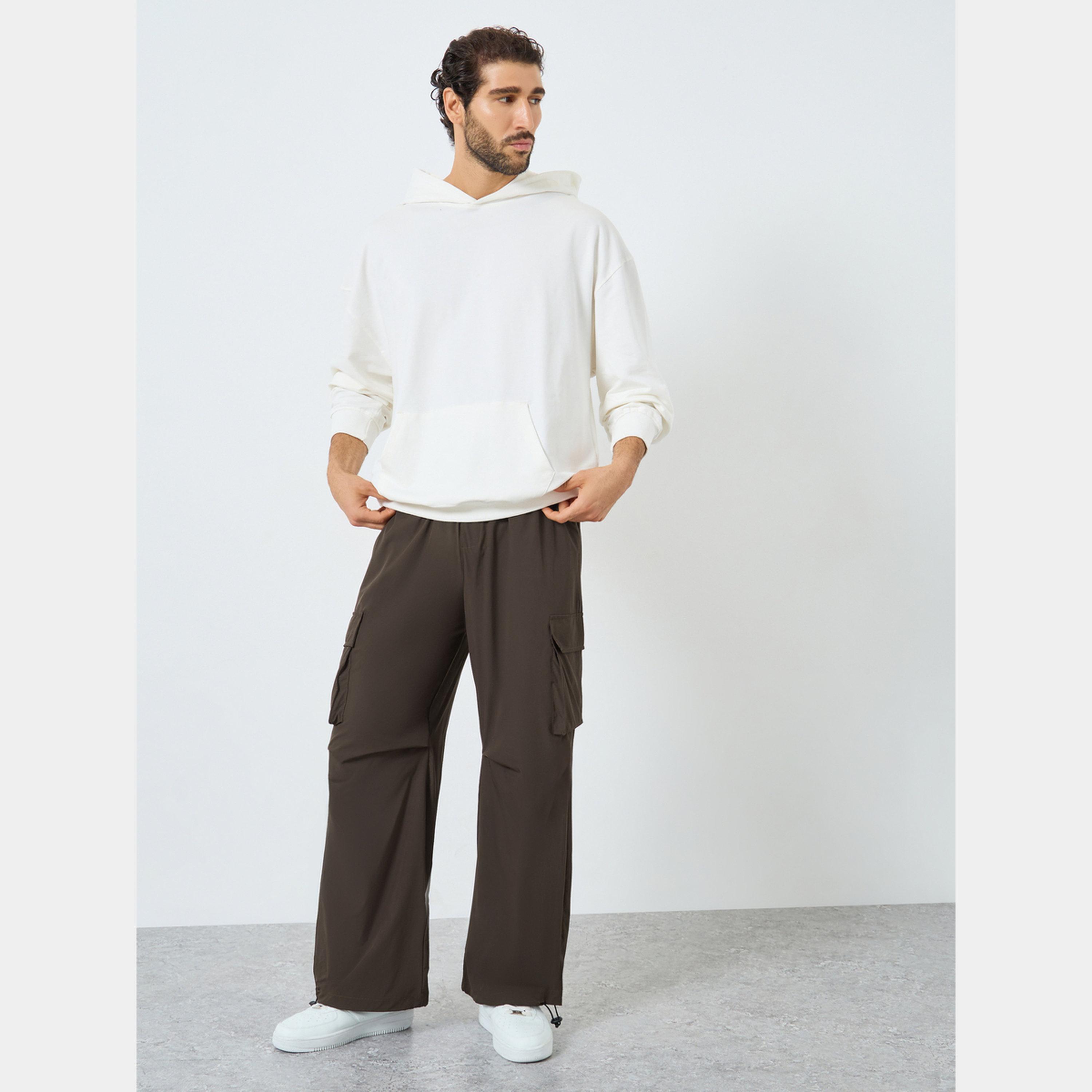 ستايلي - بنطال باراشوت نسائي بني سادة مقاس واسع مع جيوب متعددة-men-clothing-bottoms-trousersandchinos-trousers-image-2