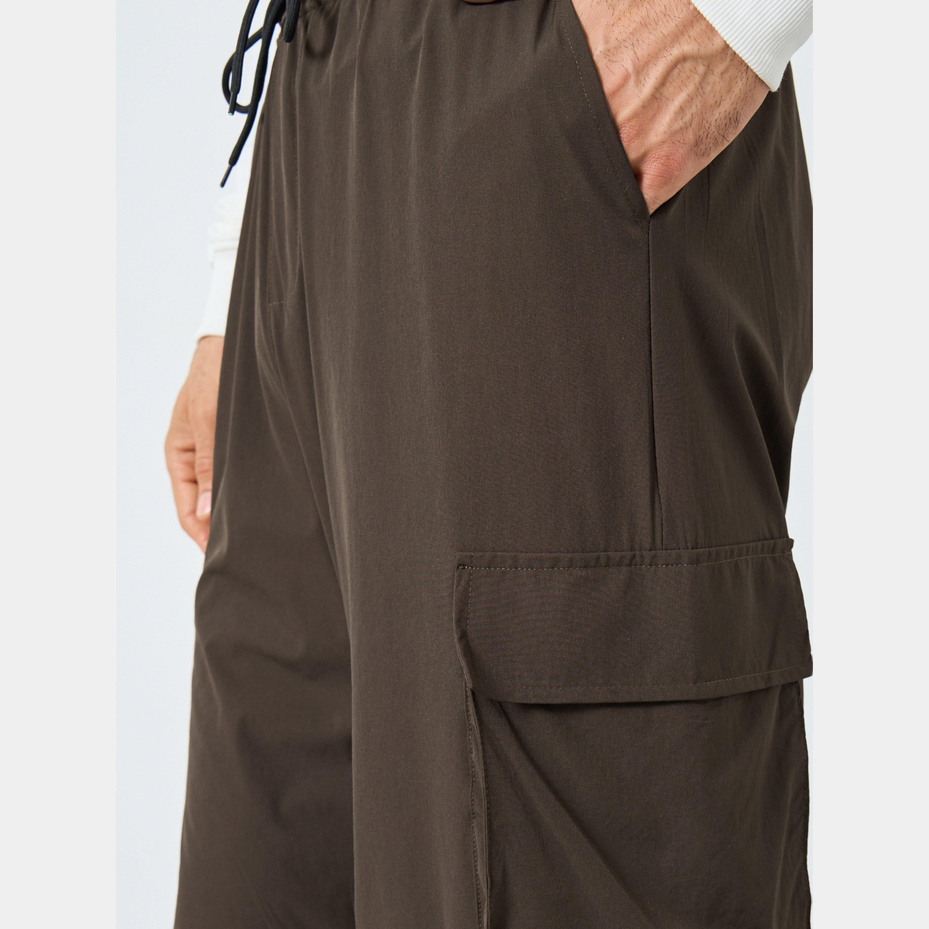 Styli Women Brown Plain Oversized Parachute Pants with Utility Pockets-men-clothing-bottoms-trousersandchinos-trousers-image-3