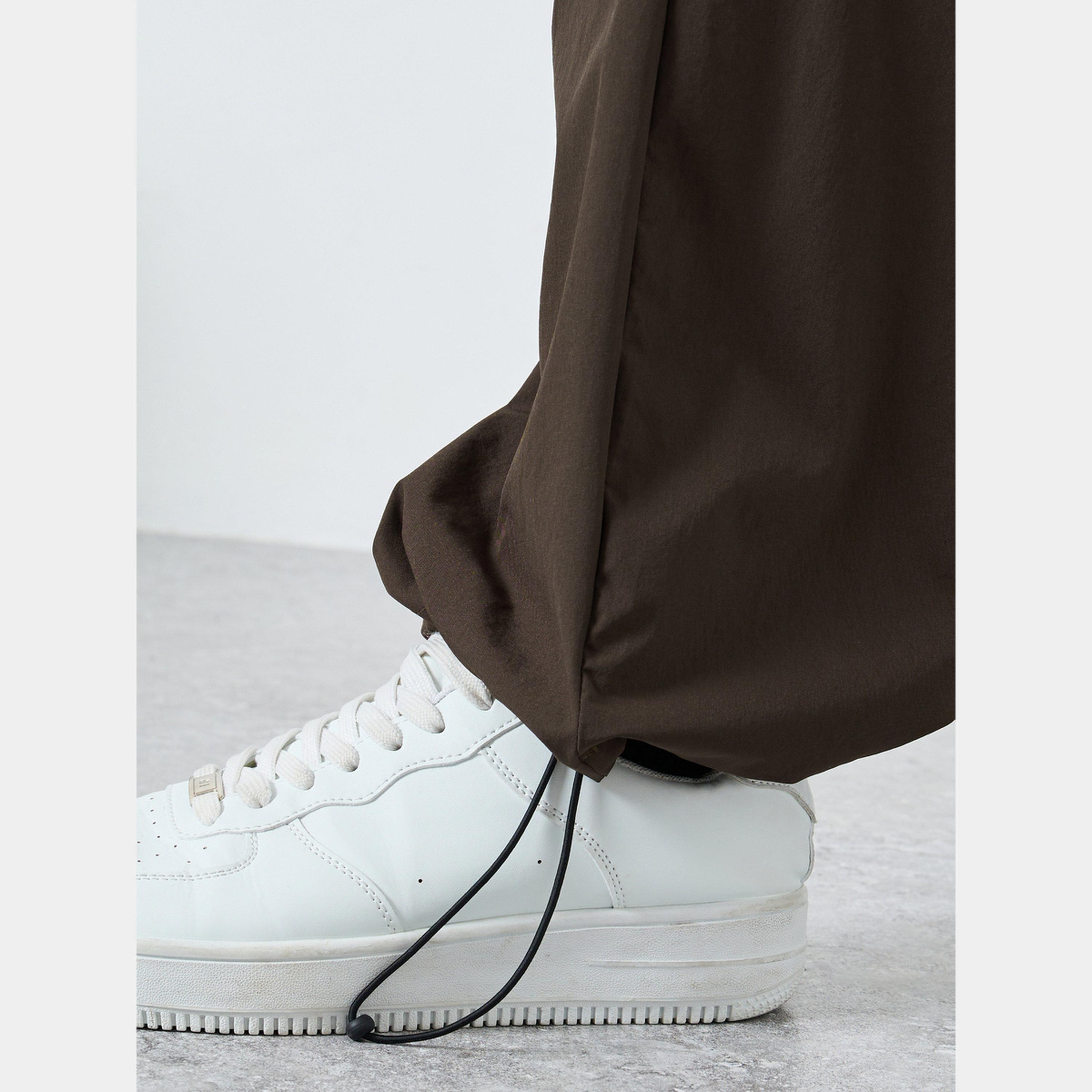 Styli Women Brown Plain Oversized Parachute Pants with Utility Pockets-men-clothing-bottoms-trousersandchinos-trousers-image-4