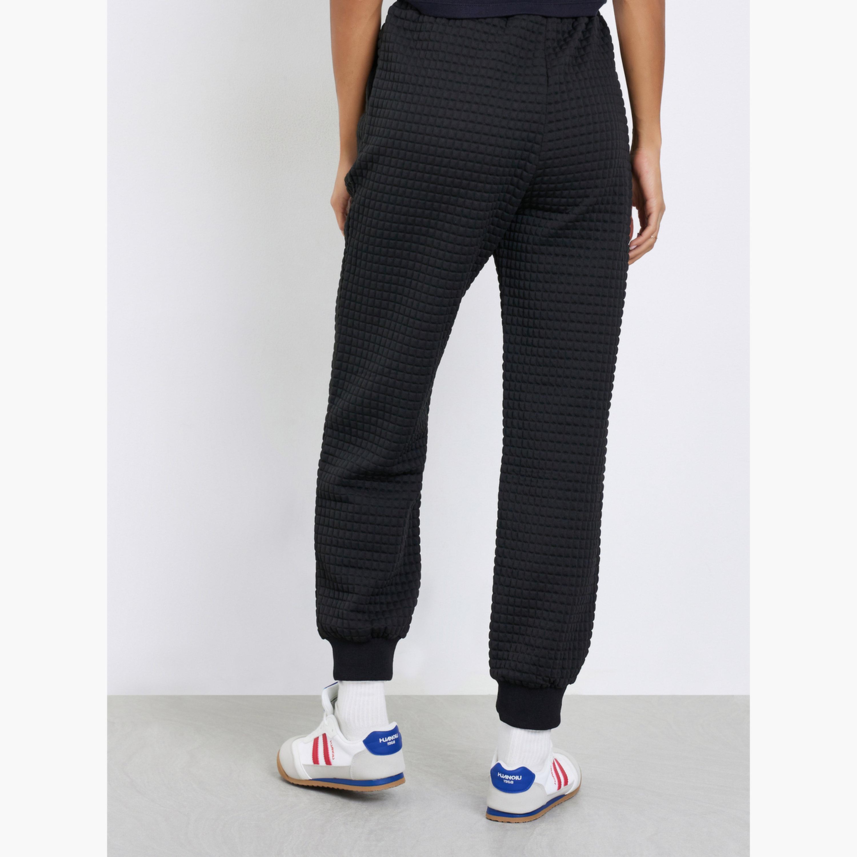 ستايلي - بنطال رياضي أسود فضفاض ومحكم للنساء-women-clothing-bottoms-joggers-image-4