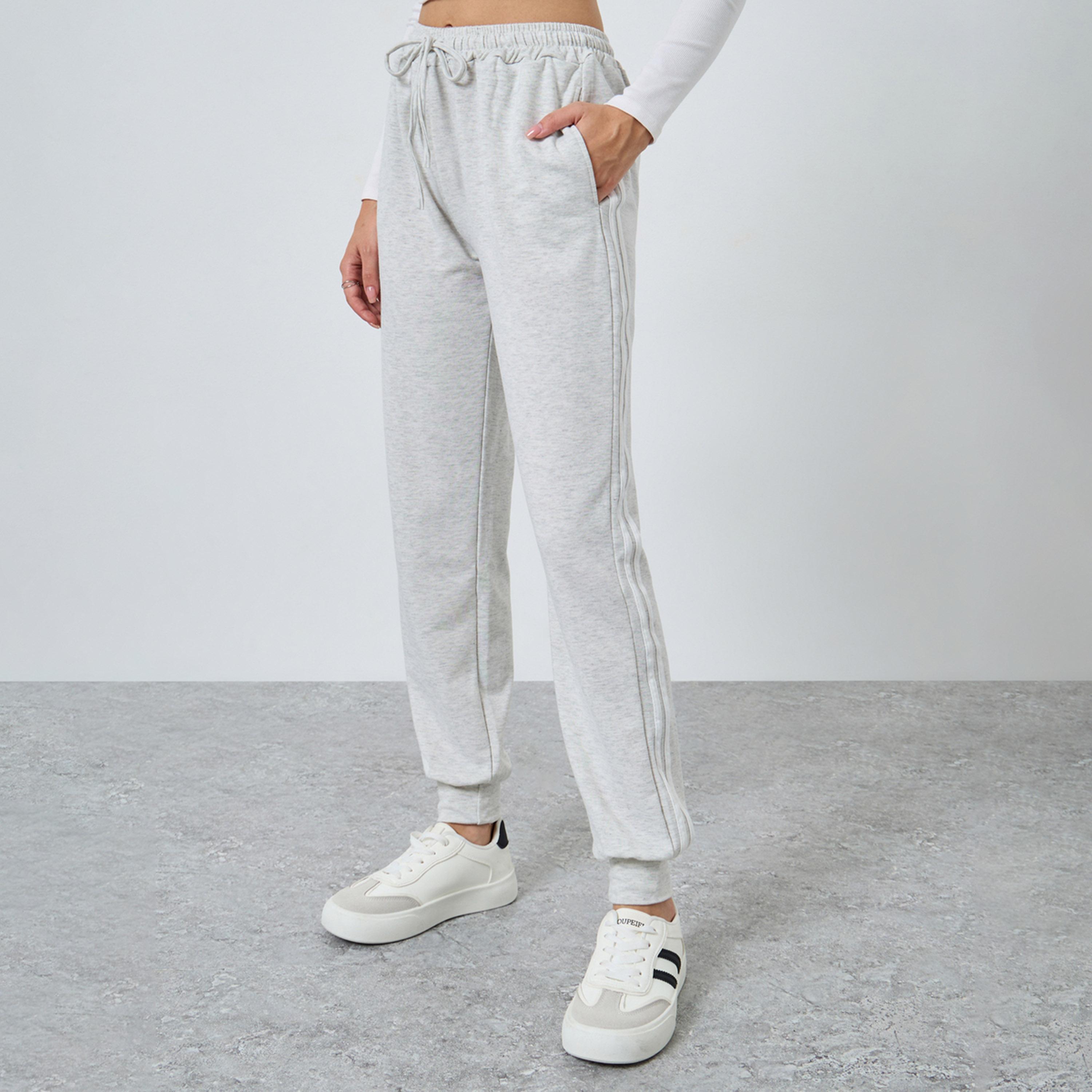 ستايلي - بنطال رياضي نسائي رمادي مخطط جانبي برباط خصر-women-clothing-bottoms-joggers-image-1