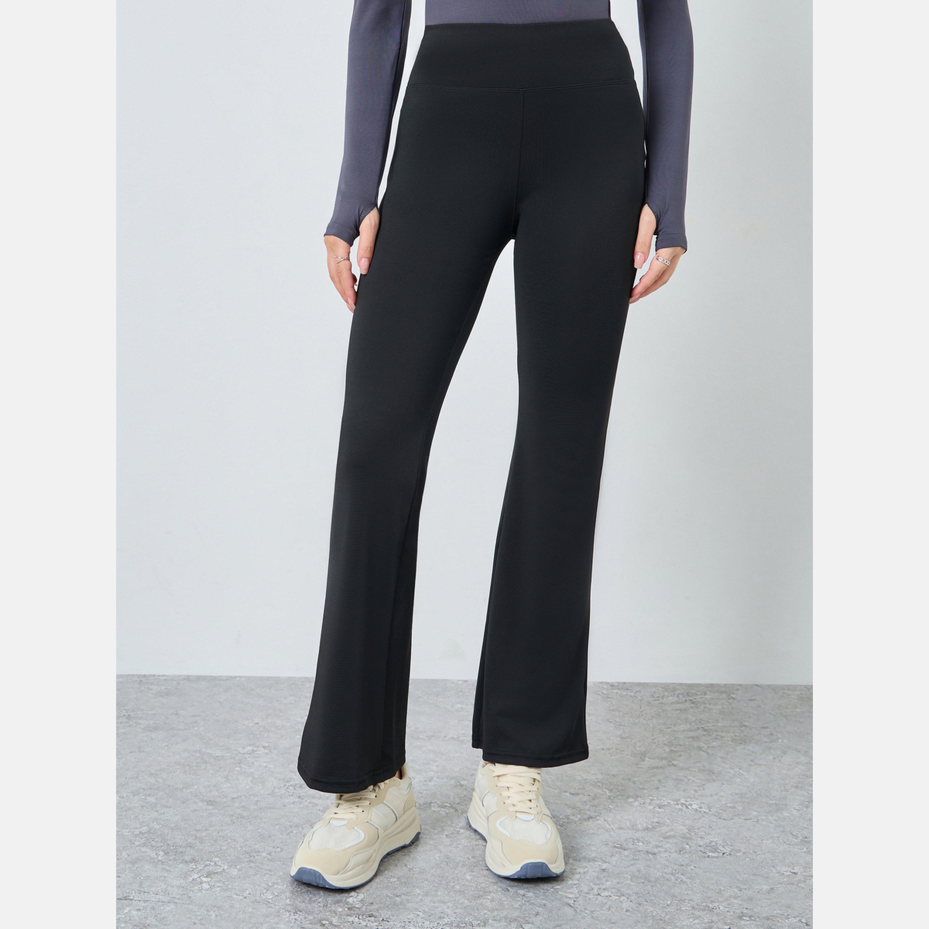 Styli Women Black Solid Plain Flared Leggings-women-clothing-bottoms-leggings-image-1