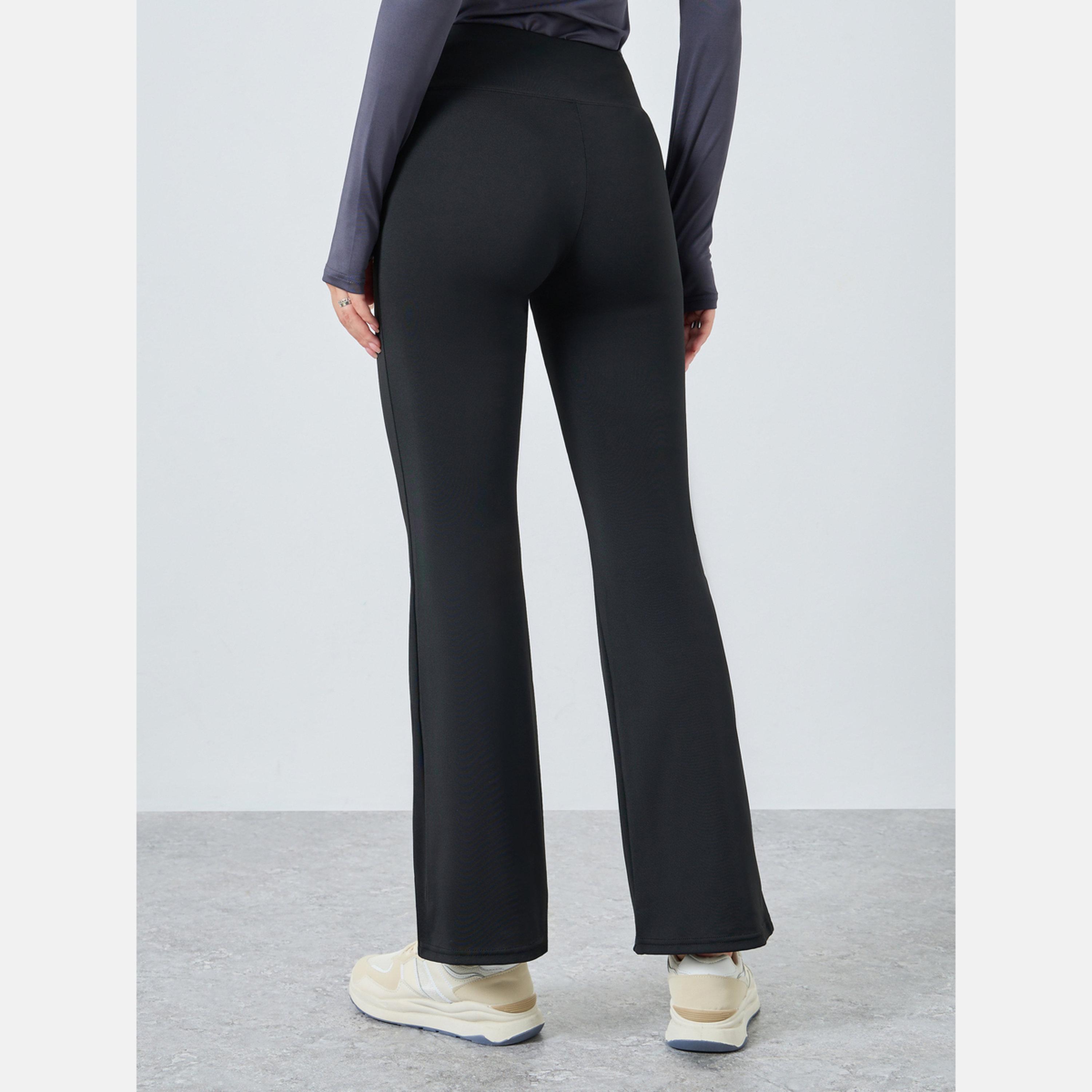 Styli Women Black Solid Plain Flared Leggings-women-clothing-bottoms-leggings-image-4