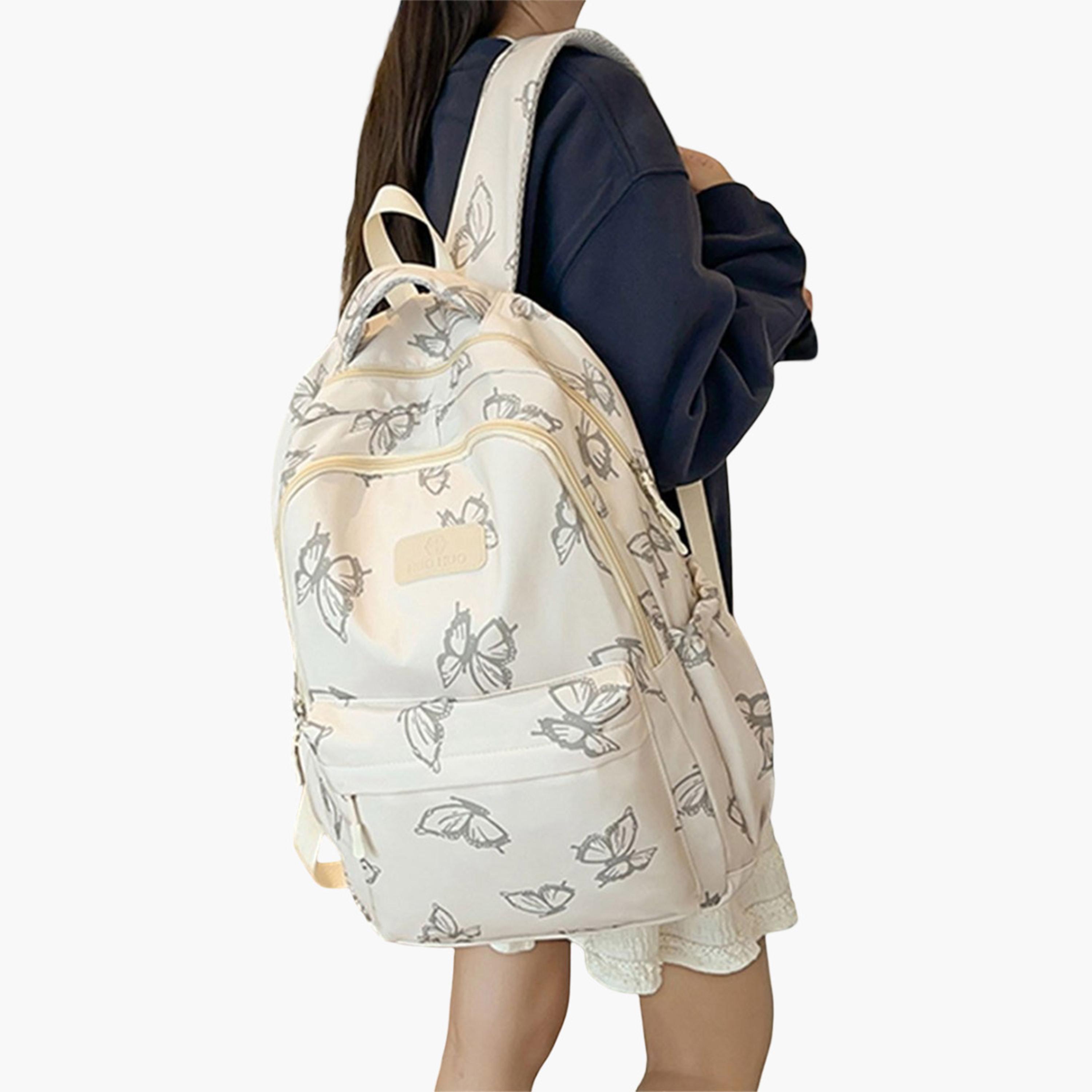 تيك تو - شنطة ظهر بسحاب مطبوع عليها رسوميات-women-bagsandwallets-backpacks-image-3