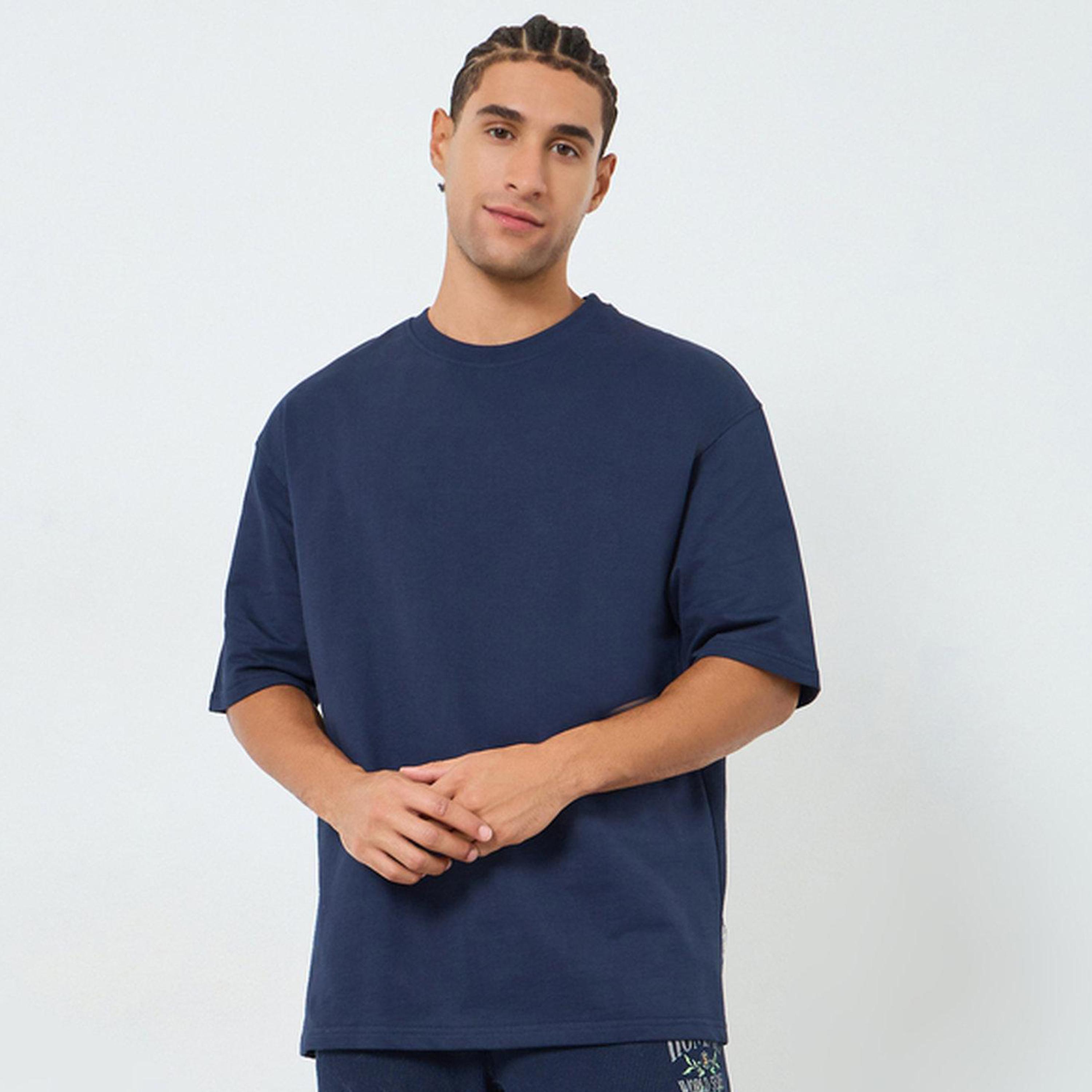 ستايلي - تيشيرت رجالي واسع قماش تيري بطبعة خلفية-men-clothing-tshirtsandpolos-tshirts-image-1