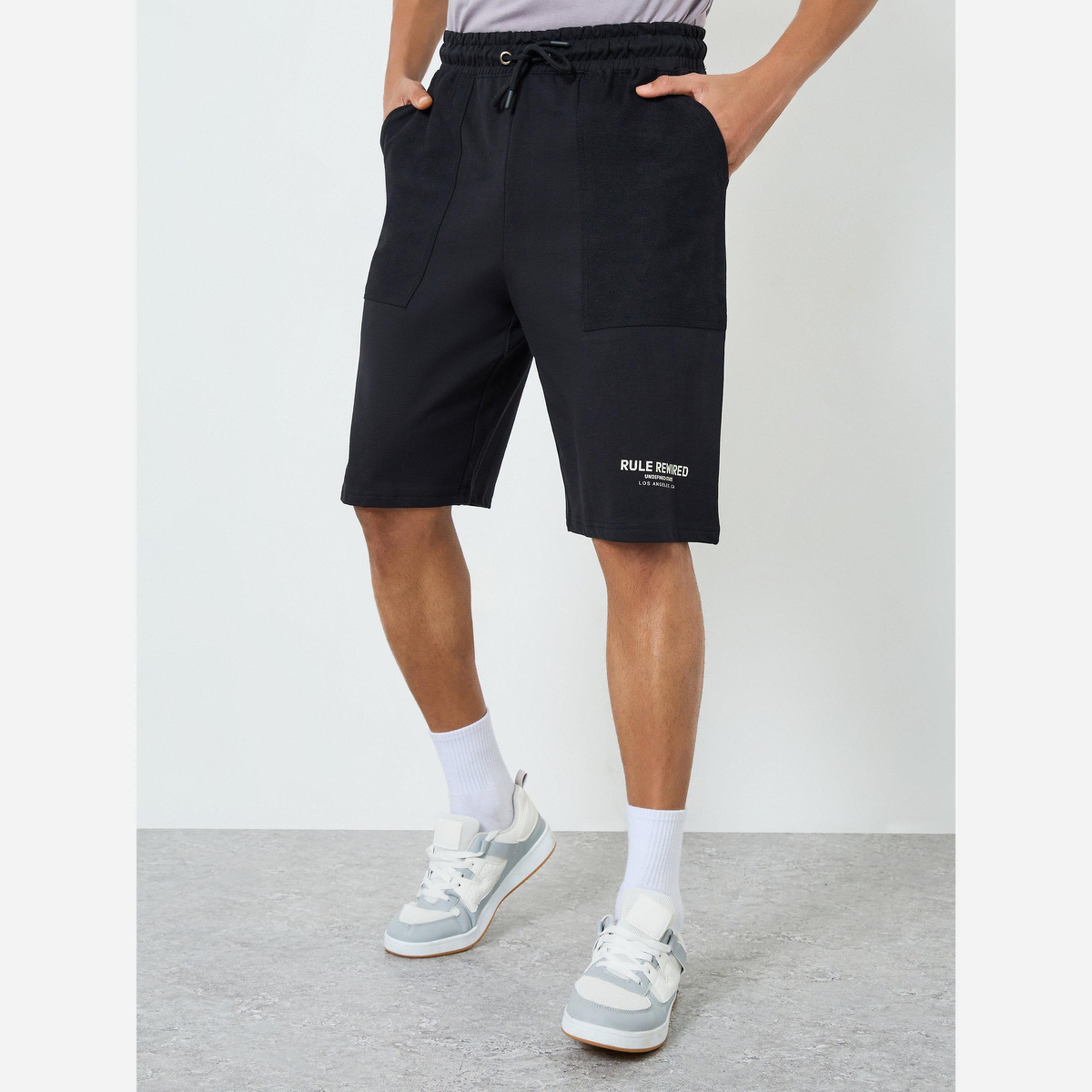 ستايلي - شورت رجالي لون أسود بجيوب قماش تيري-men-clothing-bottoms-shorts-image-1