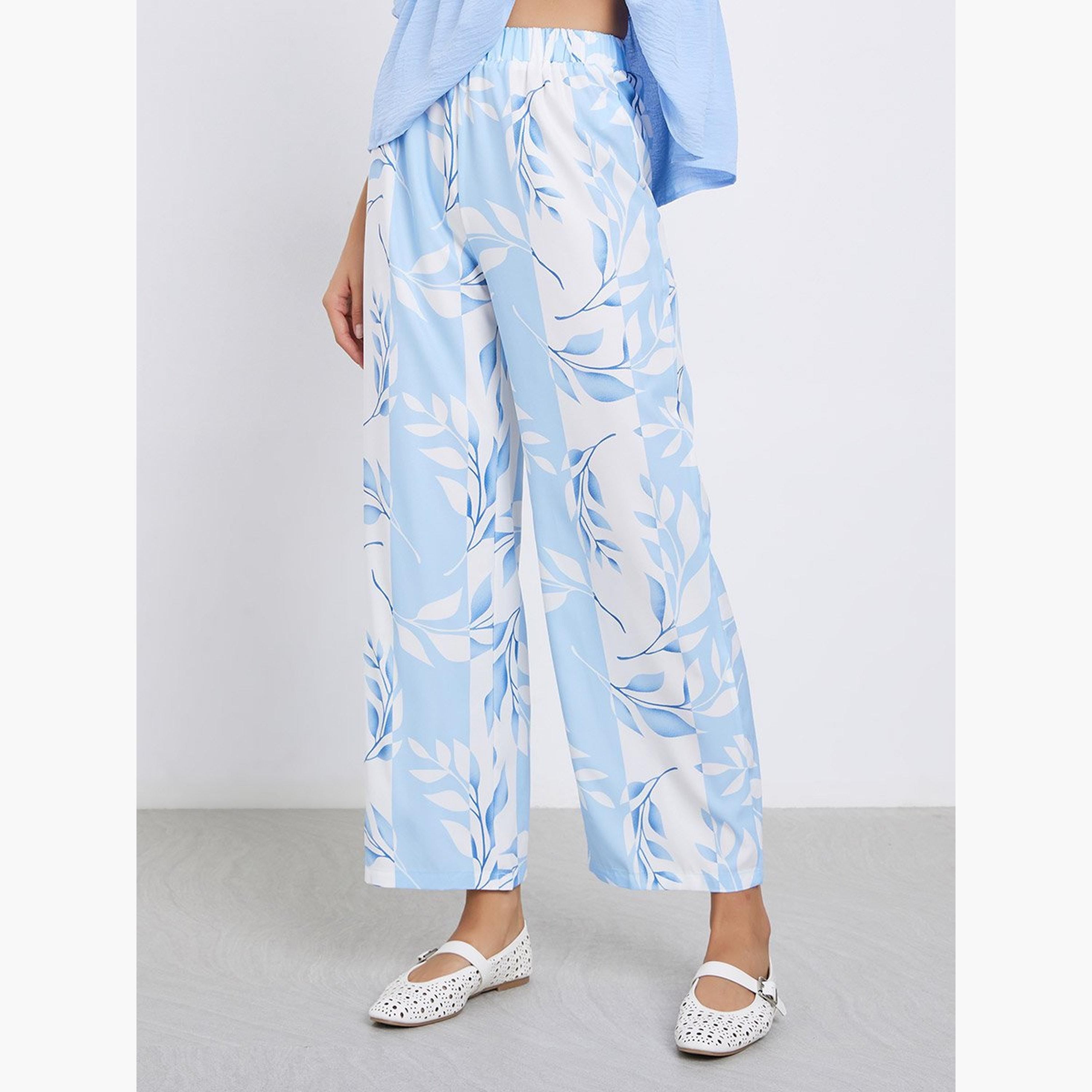 تيك تو - بلوزة زرقاء ذات حافة مكشكشة وبنطال بطبعة زهور-women-clothing-coordsets-image-5