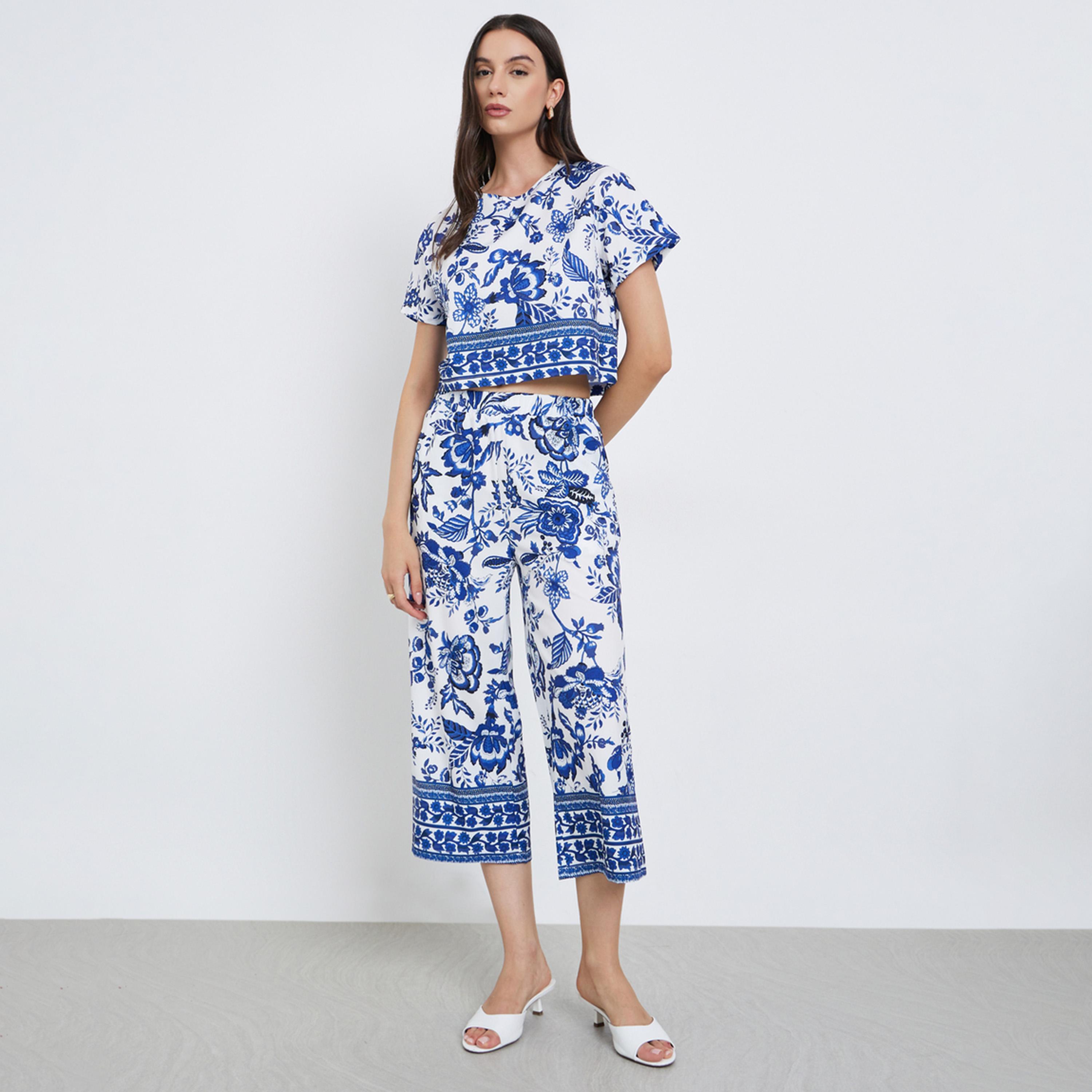تيك تو - طقم بلوزة مطبوعة بالورود بالكامل وبنطال فضفاض-women-clothing-coordsets-image-1