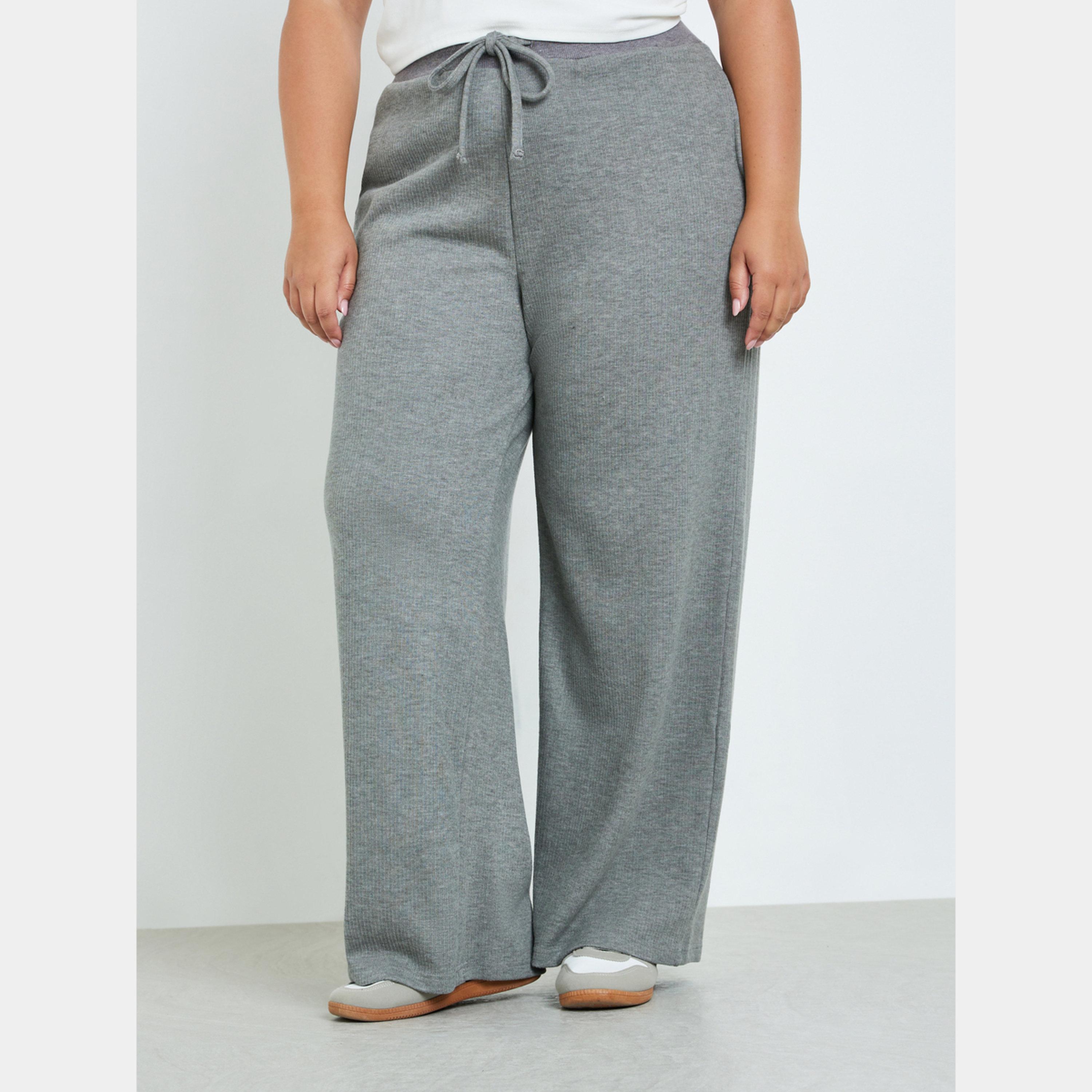 ستايلي - بنطال رياضي مريح مضلع باللون الرمادي بمقاس واسع-women-clothing-bottoms-joggers-image-1