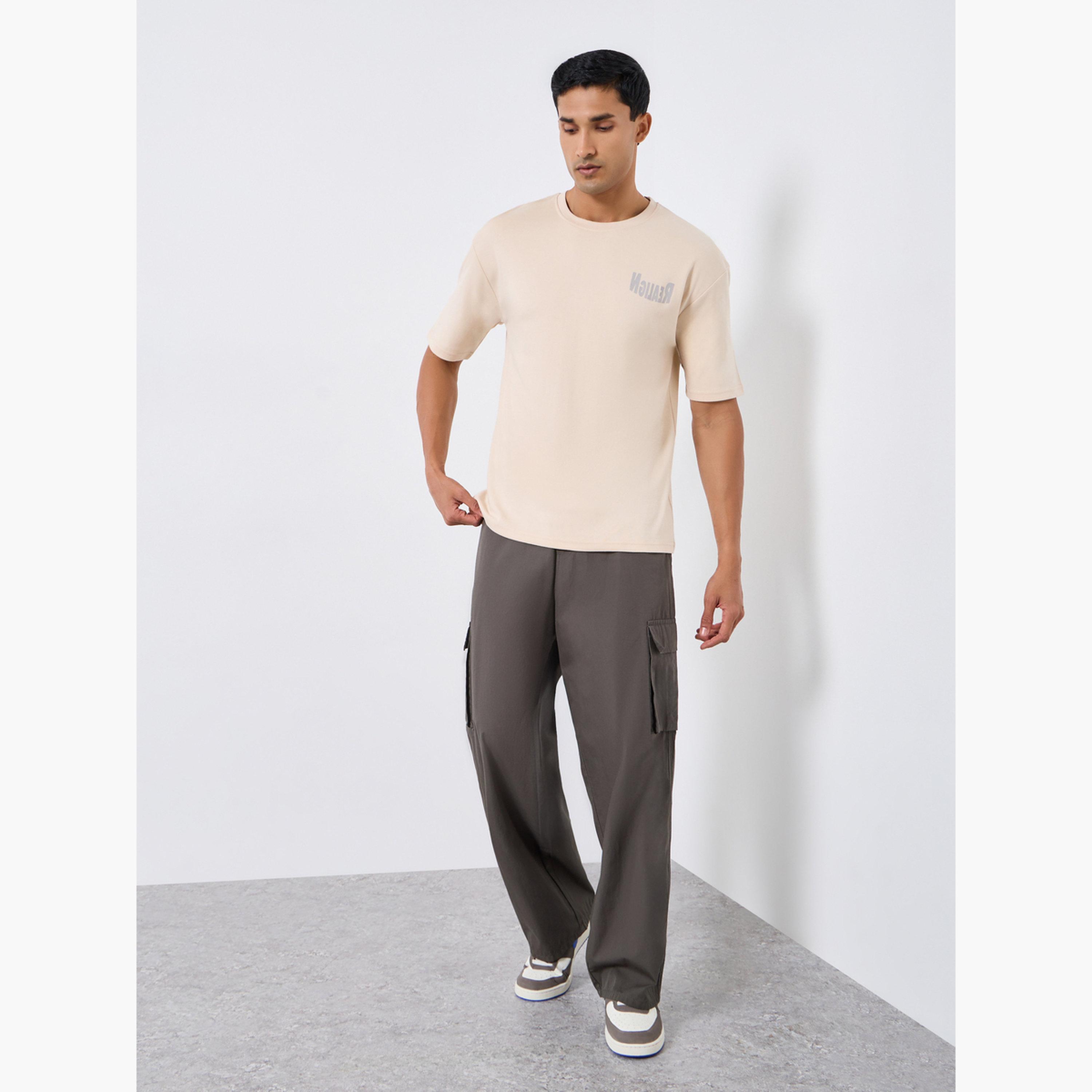 Styli Men Beige Graphic Print Oversized T-Shirt-men-clothing-tshirtsandpolos-tshirts-image-2