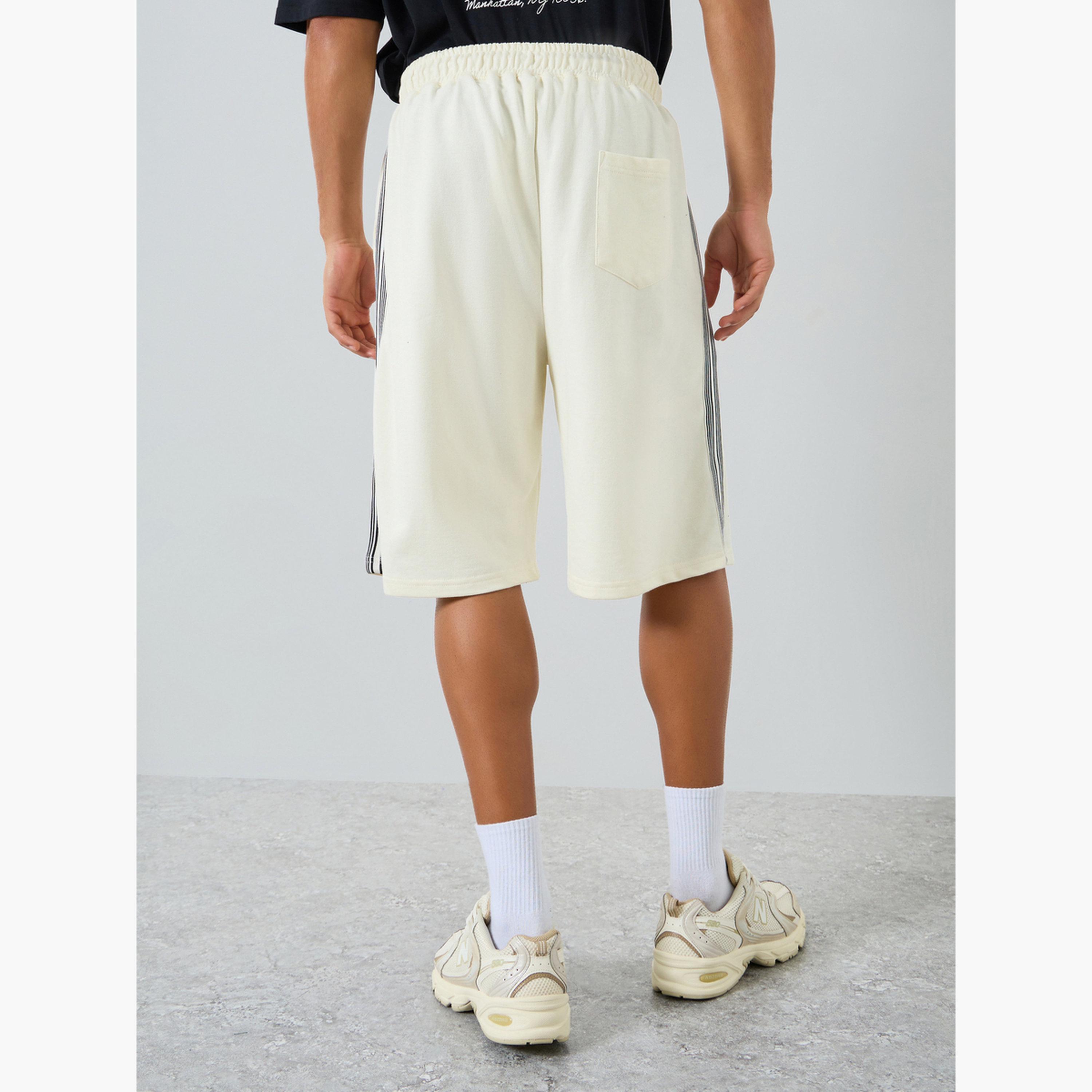شورت تيري مخطط بقصة واسعة-men-clothing-bottoms-shorts-image-4
