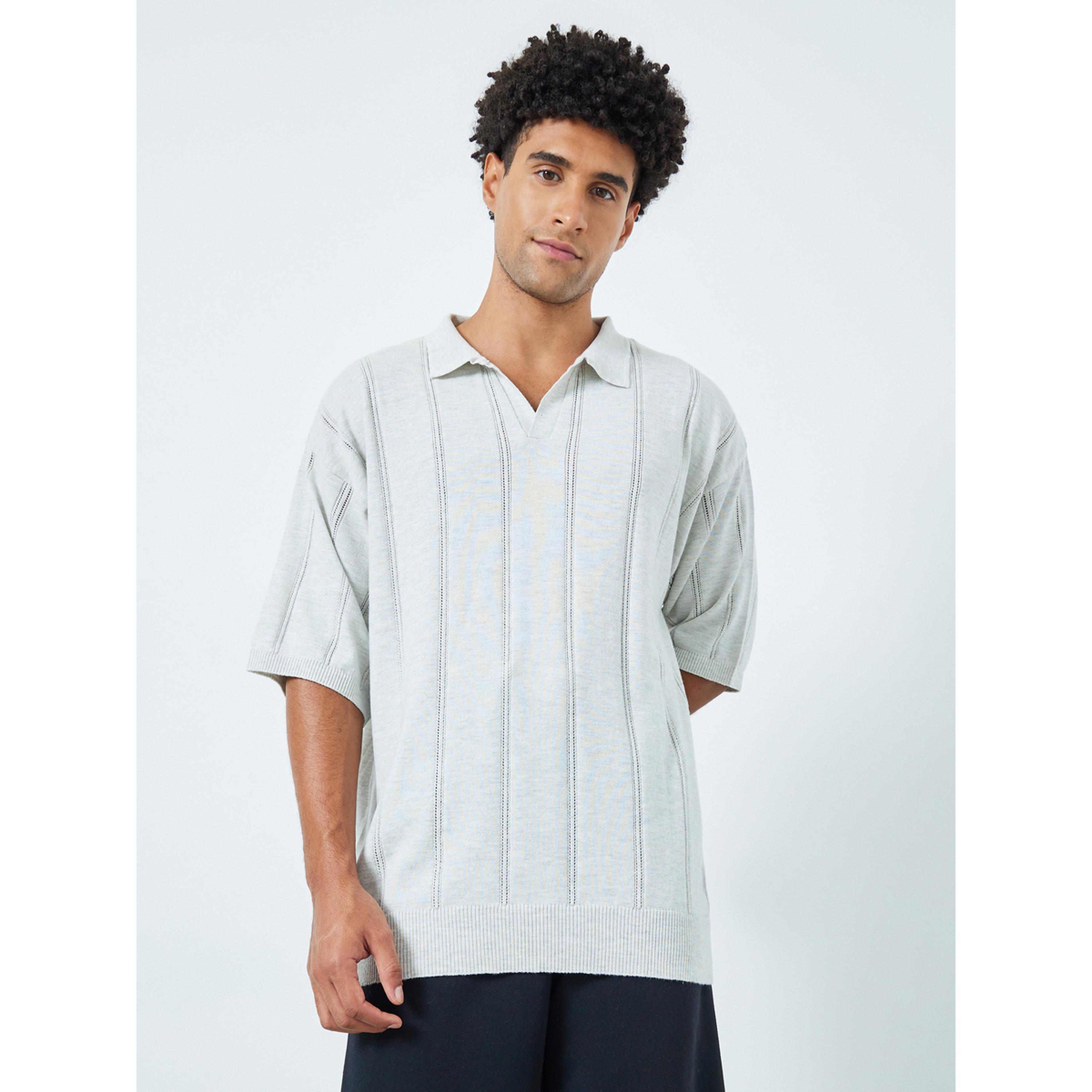 قميص بولو محبوك بارز الملمس بقصة مريحة-men-clothing-tshirtsandpolos-polos-image-1