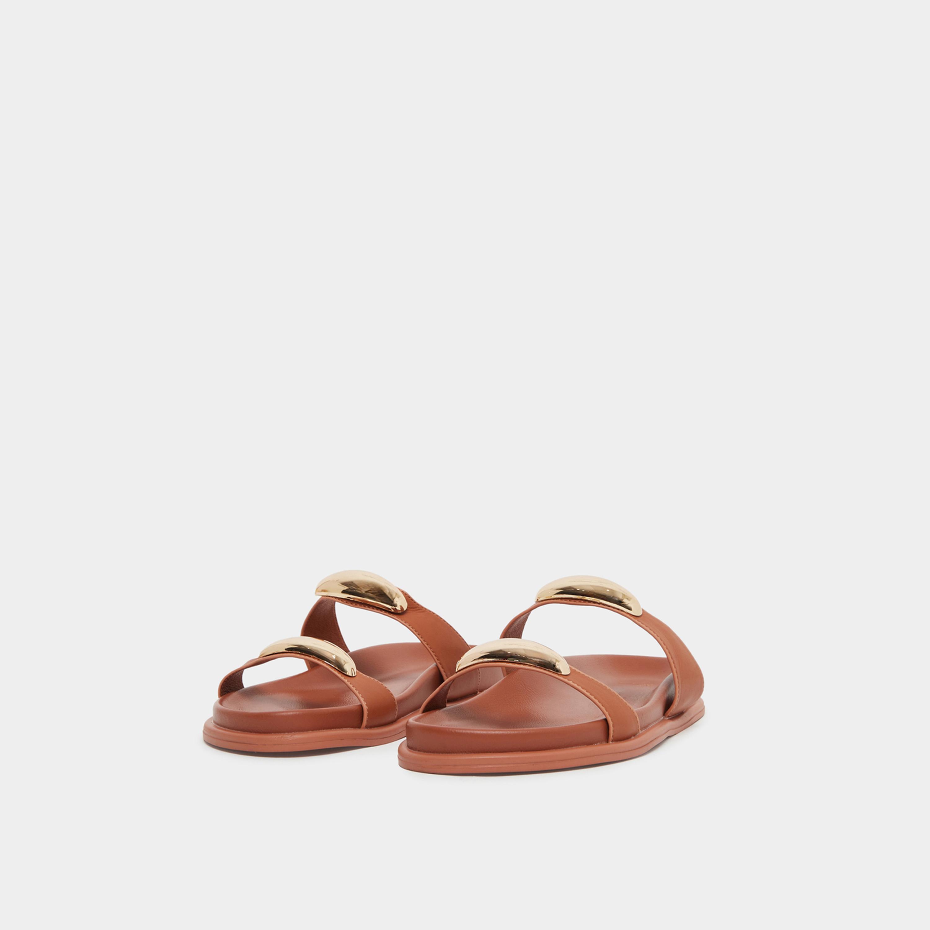 ستايلي - صندل نسائي بني اللون مزين بزخارف معدنية-women-shoes-flats-slides-image-1