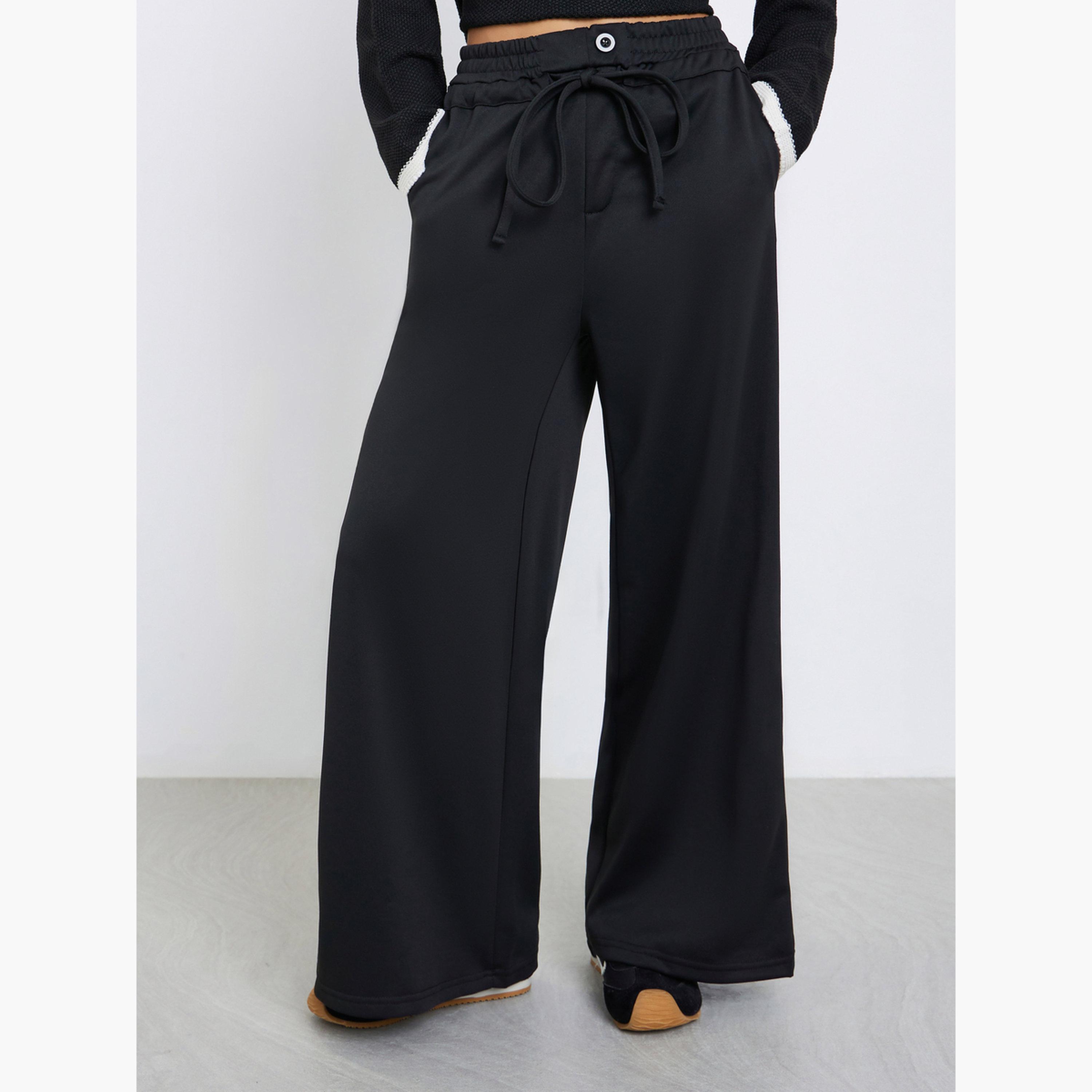 Styli Black Wide Leg Joggers with Tie Detail-women-clothing-bottoms-joggers-image-1