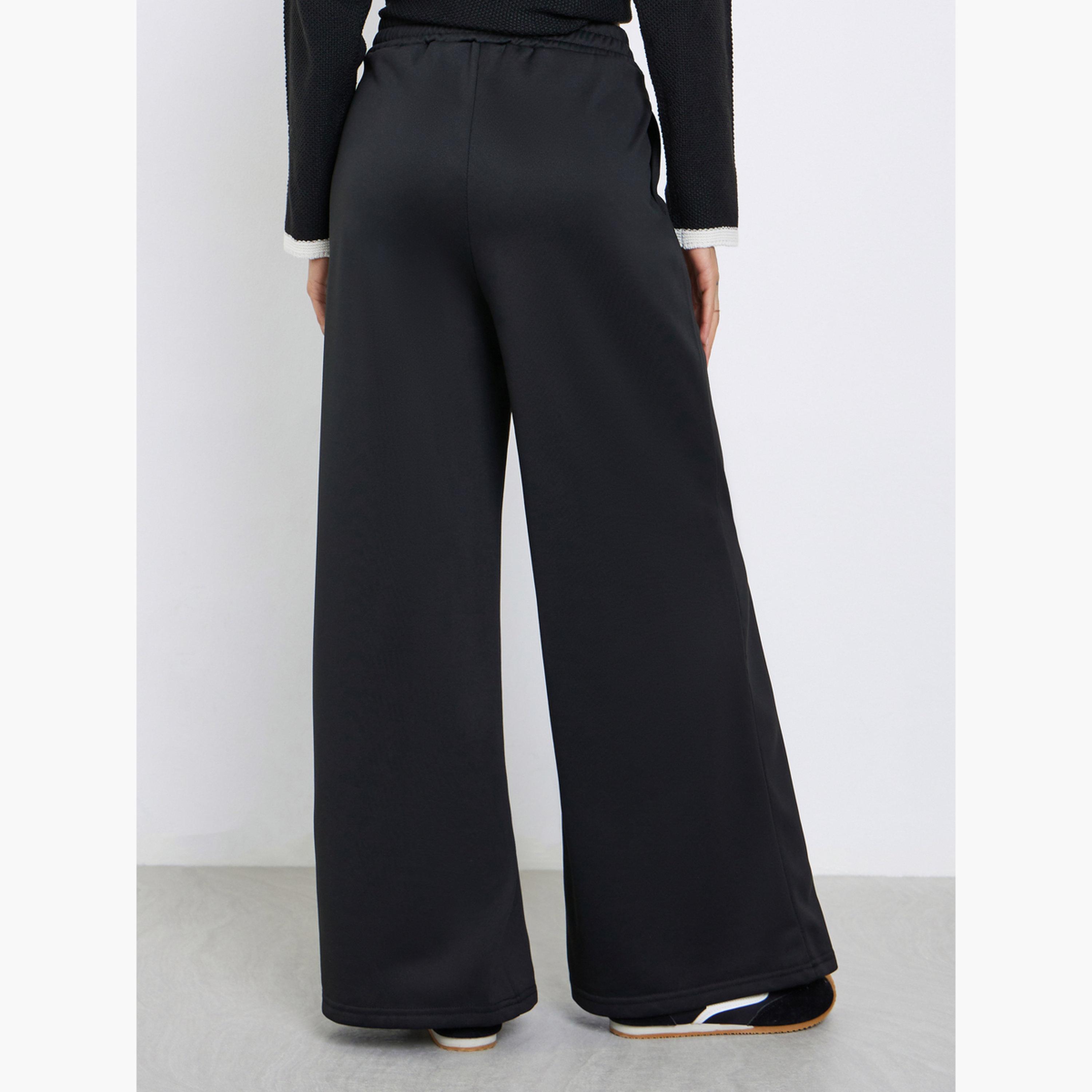 ستايلي - بنطال رياضي أسود واسع الساق مع رباط-women-clothing-bottoms-joggers-image-4