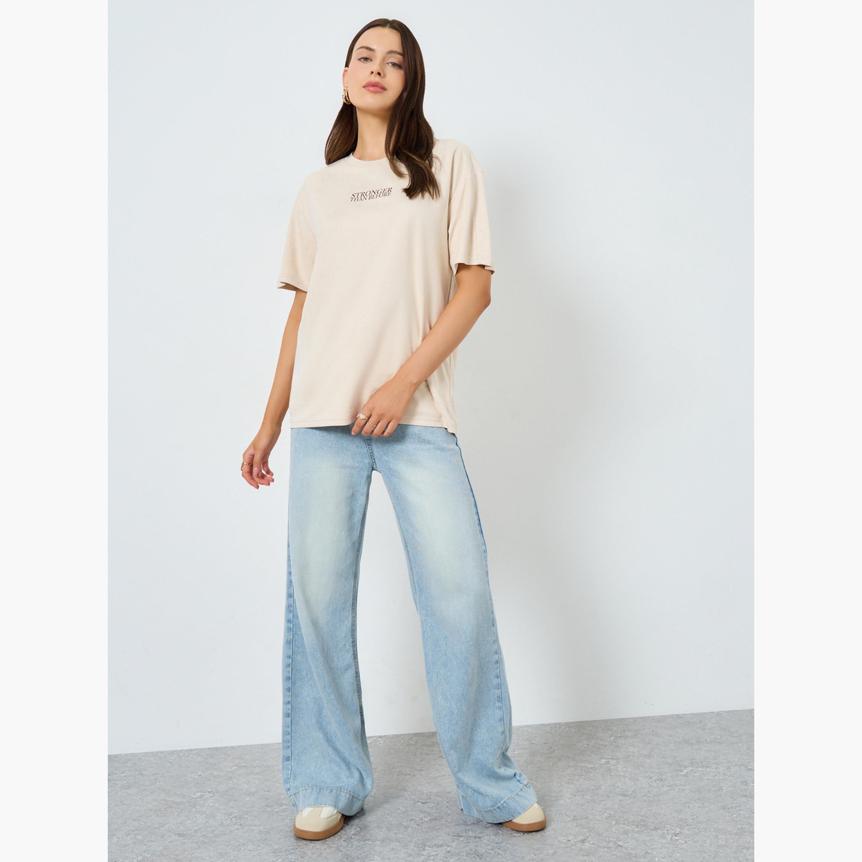 ستايلي - تي شيرت بيج مقاس واسع بشعار-women-clothing-tshirts-image-2